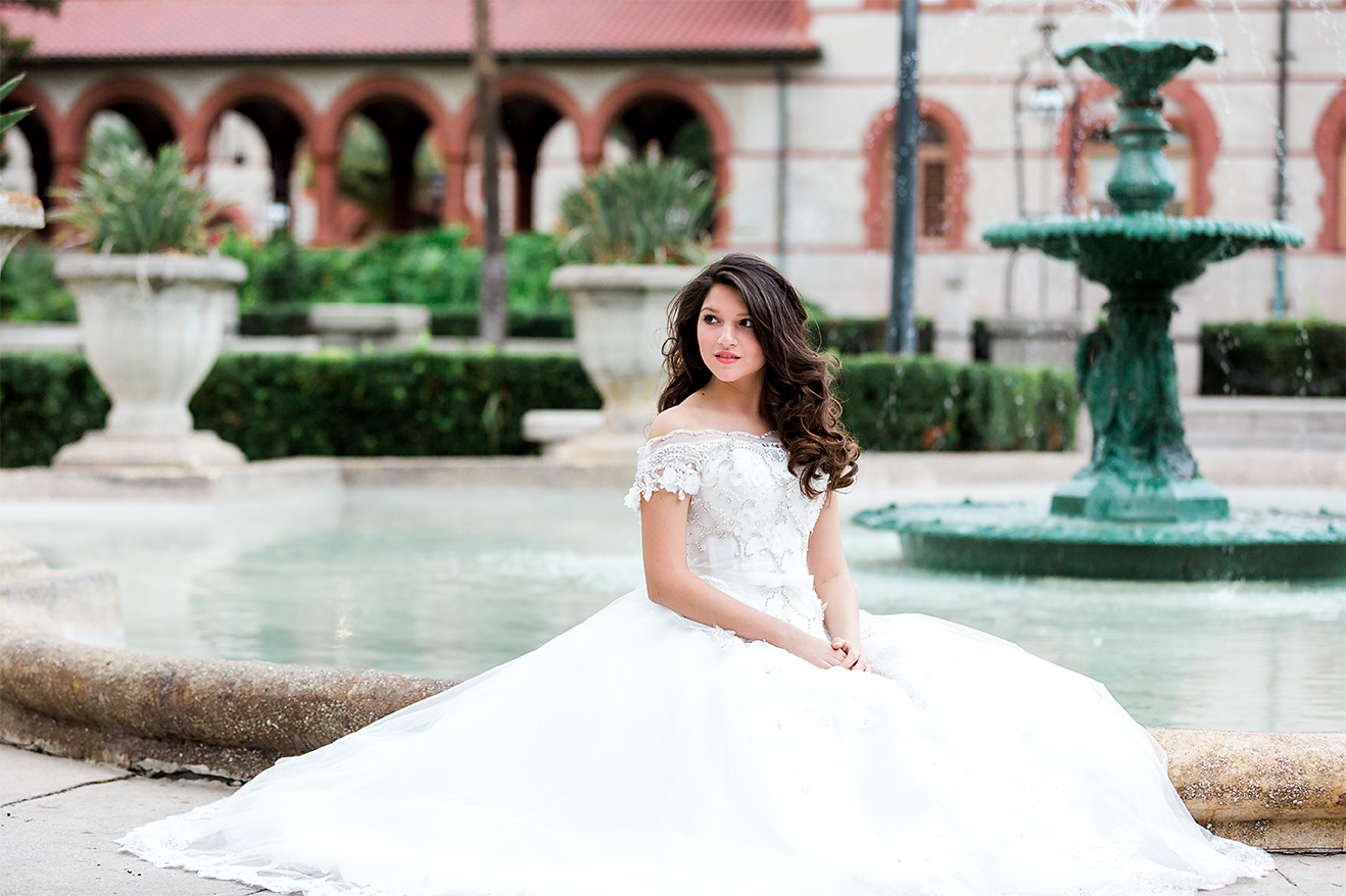 Quincenera portrait session in front of Casa Monica Hotel