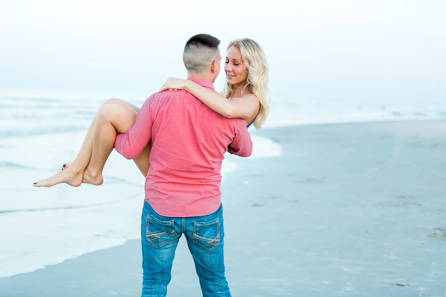 engagement pose ideas at the beach.jpg