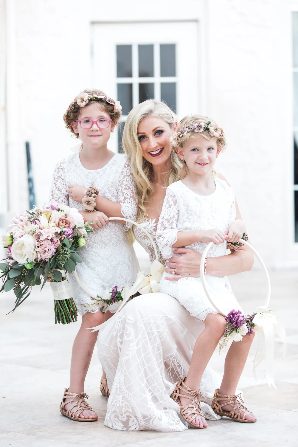 bride with her flower gils in casa marina wedding in jacksonville beach