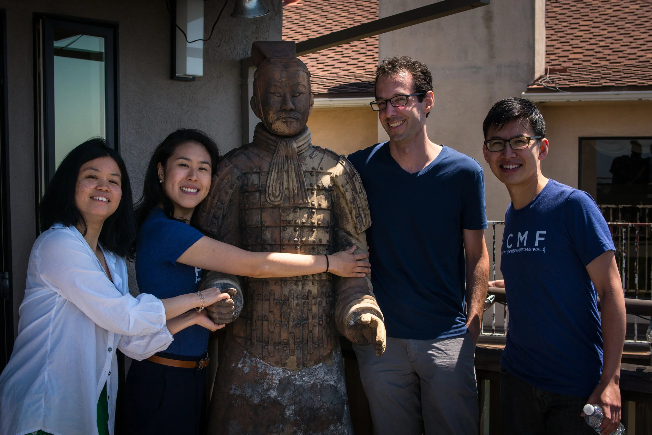 Bonding with a terracotta warrior at the home of a PCMF supporter.