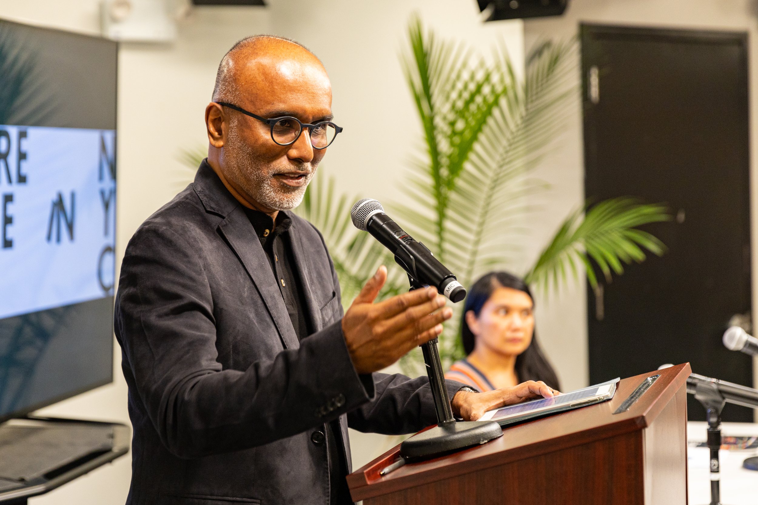 Cherian George delivers Closing Address at the podium.jpg