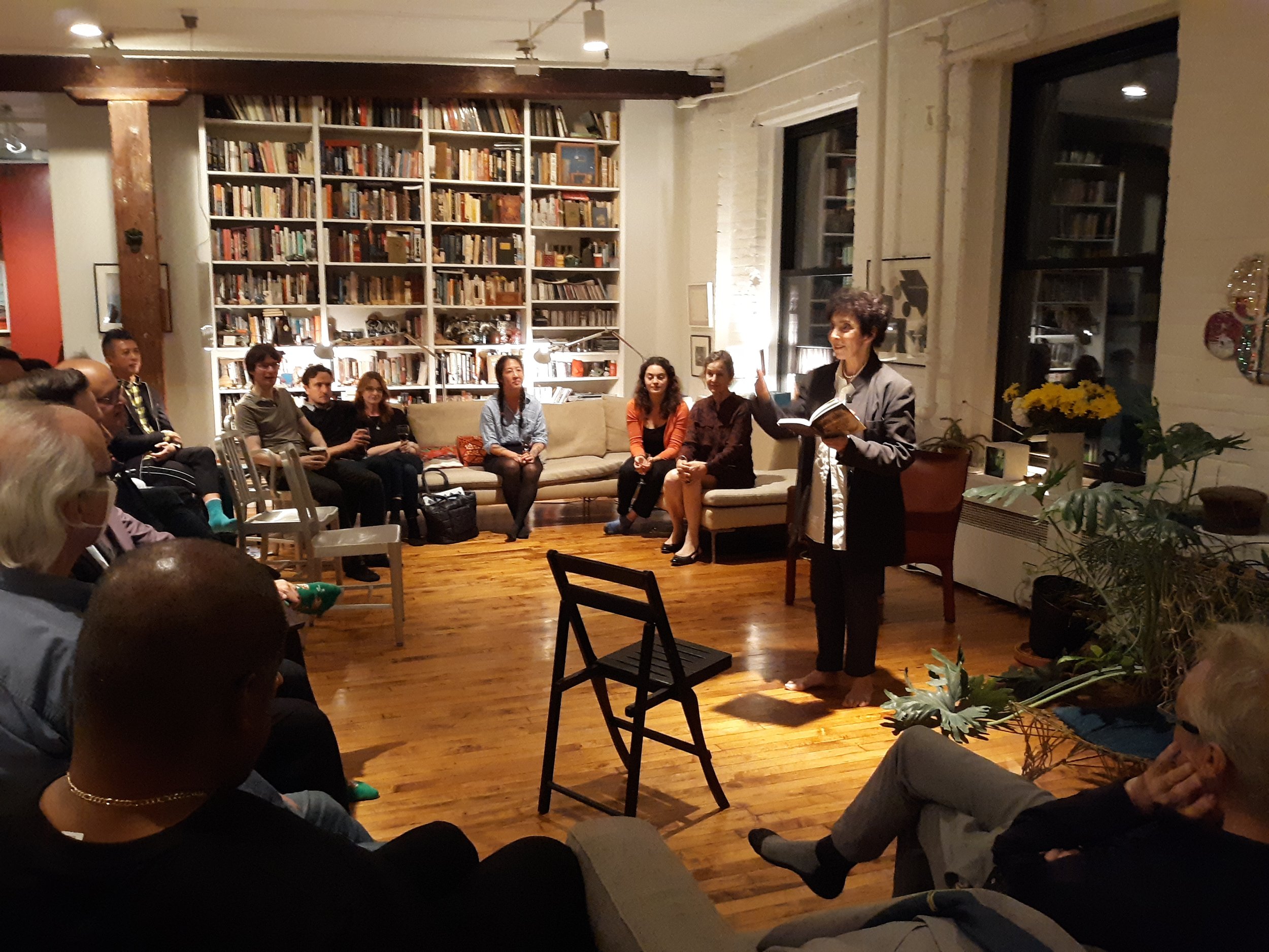 Laurie Stone reading at Opening Party.jpg