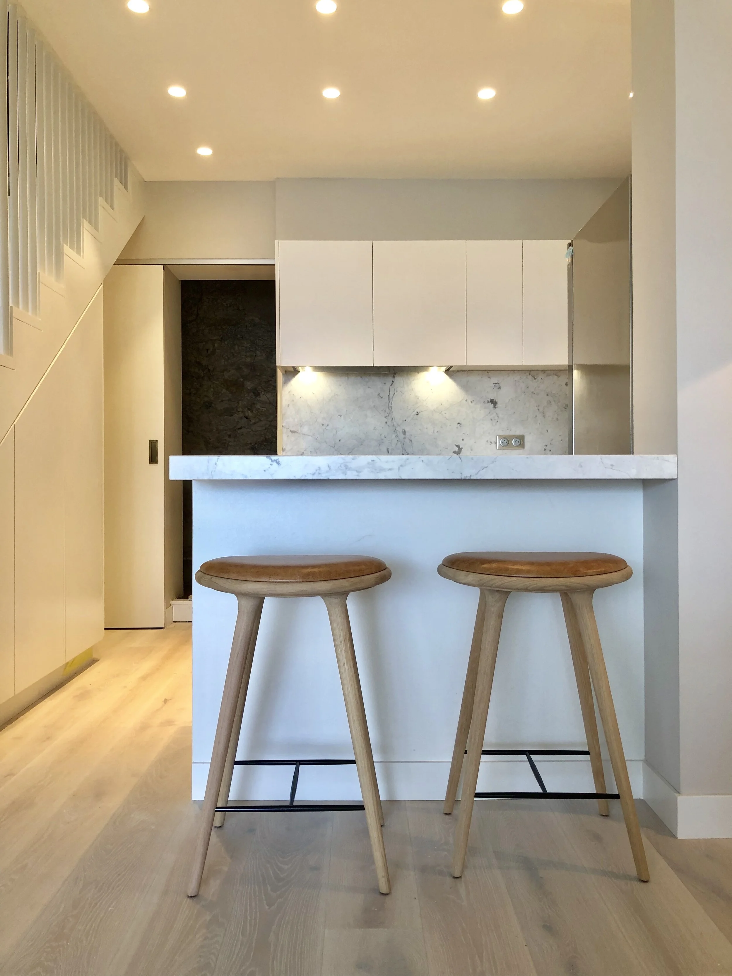 Mater barstools and Flos spot lights