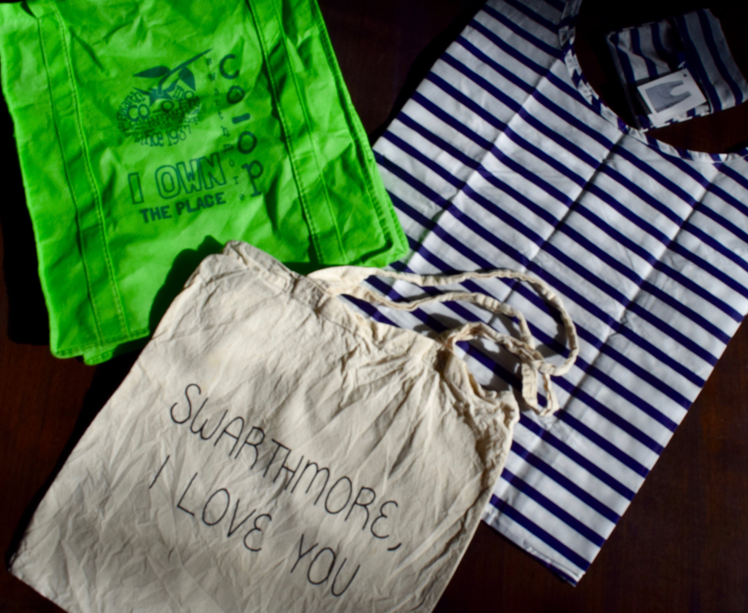 Some reusable bag options available at local merchants; Pictured at left: Swarthmore Co-op bag, middle: Compendium tote, right: H.O.M. Baggu tote