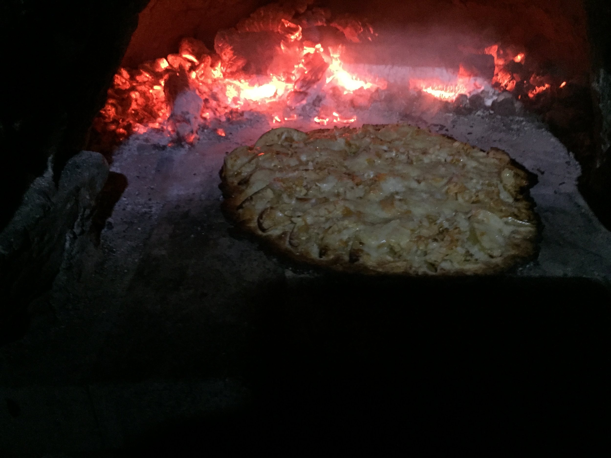 The pizza meets the outdoor pizza oven!