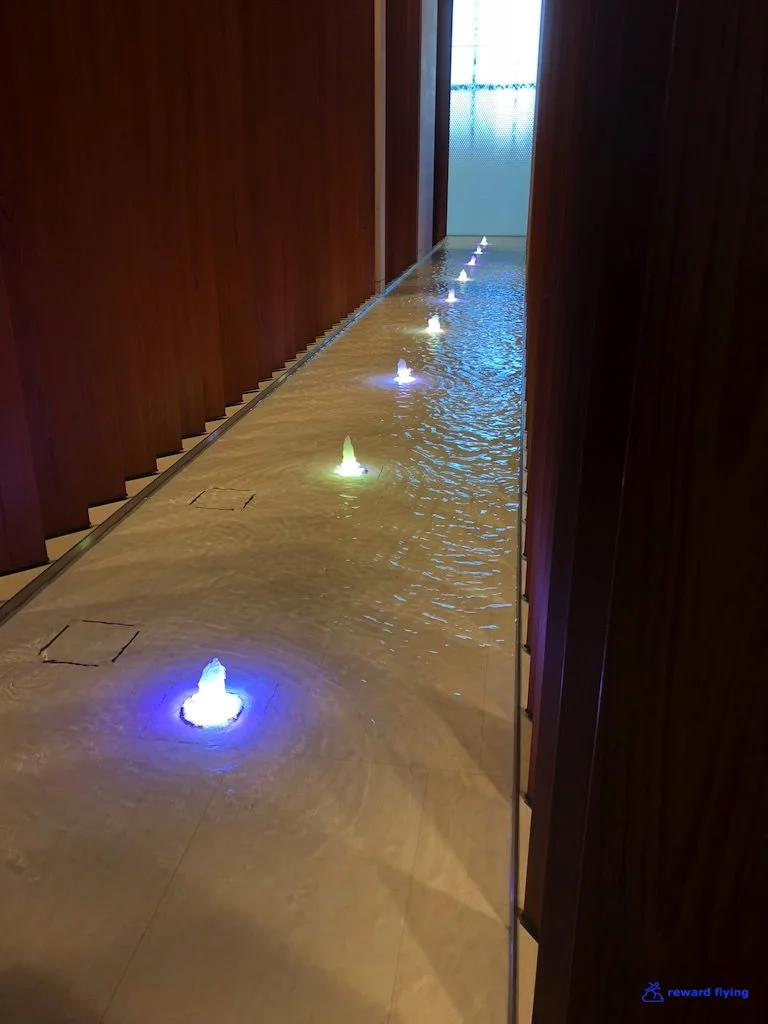 QR DOH FCL Spa Water running.jpg