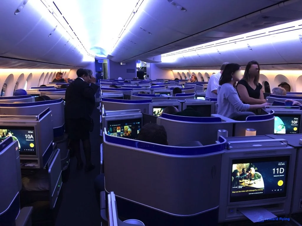 UA2418 Cabin Aisle Forward Blue light.jpg