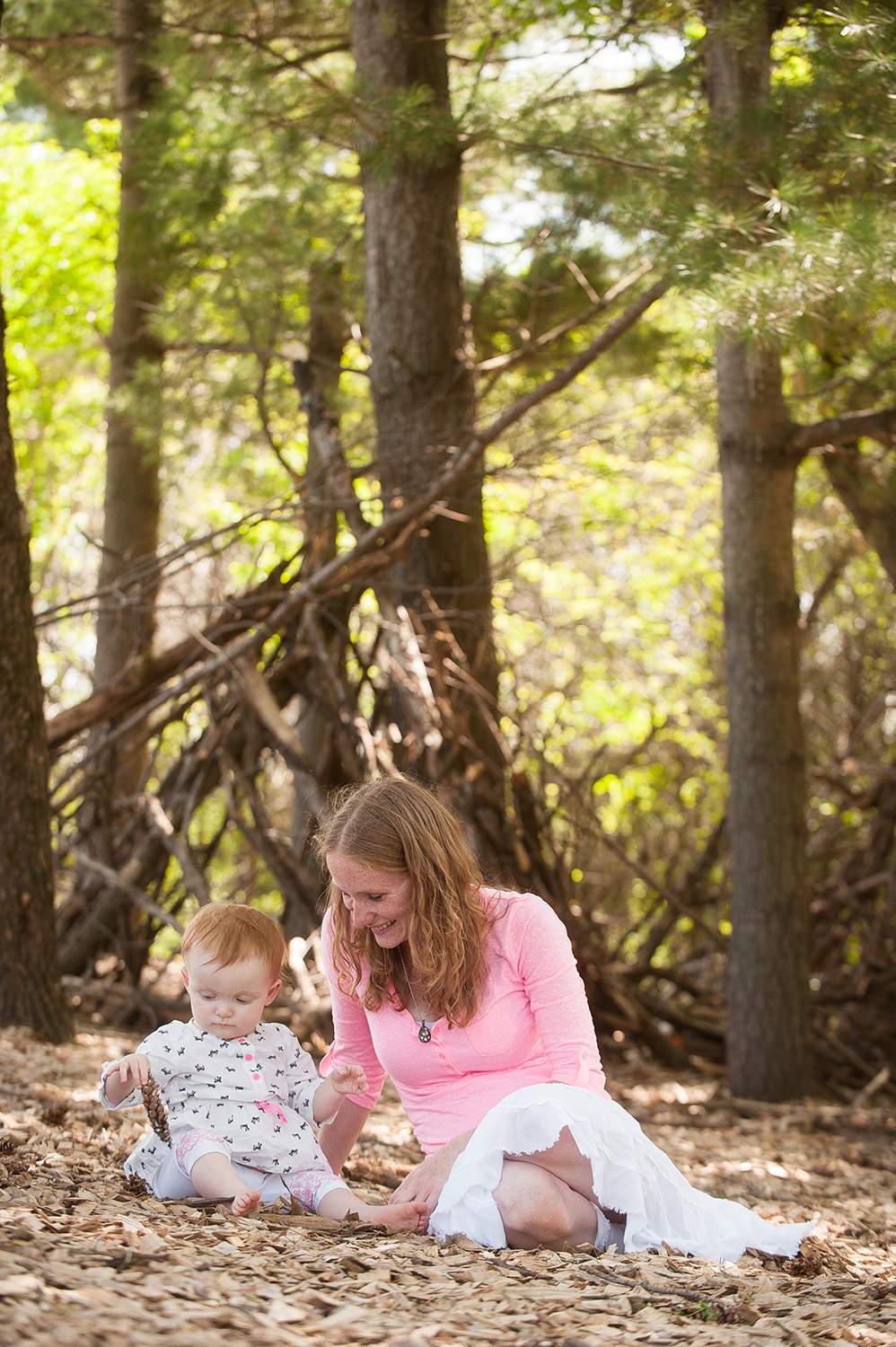 Elko New Market Family Photographer Anthologie specializes in capturing candid moments with you and your family. Mother and daughter photographed at White Tail Woods Park in Rosemount, MN.