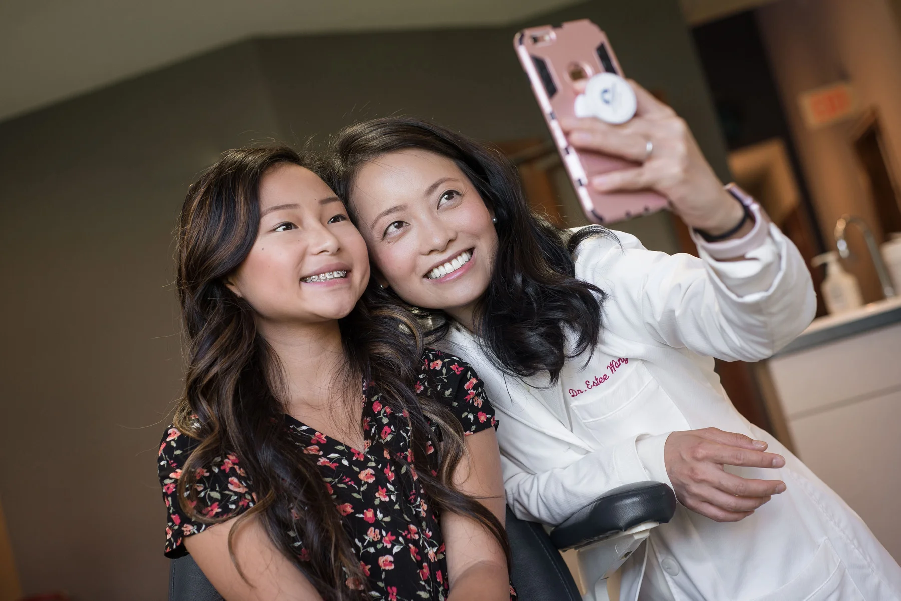 Dr. Estee Wang grabs a selfie with one of her patients for her “borntosmile” hashtag while working at her practice in Maplewood, Minn. I chose this photo as it illustrates Dr. Wang’s own philosophy of showcasing her personality in the workplace as well as my own. This image presented itself in between more staged photos. I think had I not went into the assignment thinking as a photojournalist instead of a commercial photographer only I would have missed the opportunity for a great photo.
