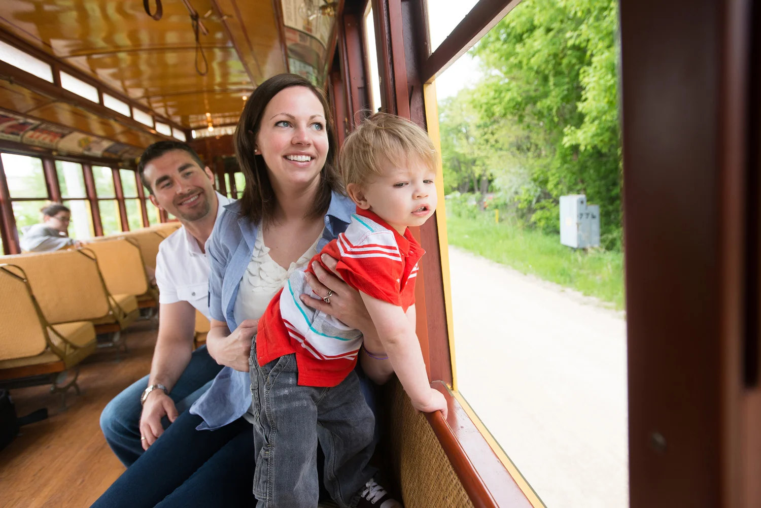 A family takes in the sights from the vantage point of the Como-Harriet Streetcar line in Southwest Minneapolis.