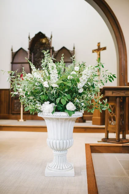 Green and white ceremony flowers at Salve Chapel Newport