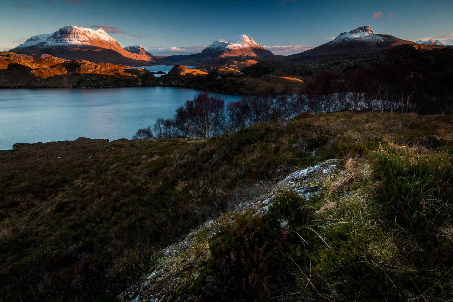 Sunset looking toward Loch Sionasgaig with Cùl Mor, Cùl Beag and Stac Pollaidh.