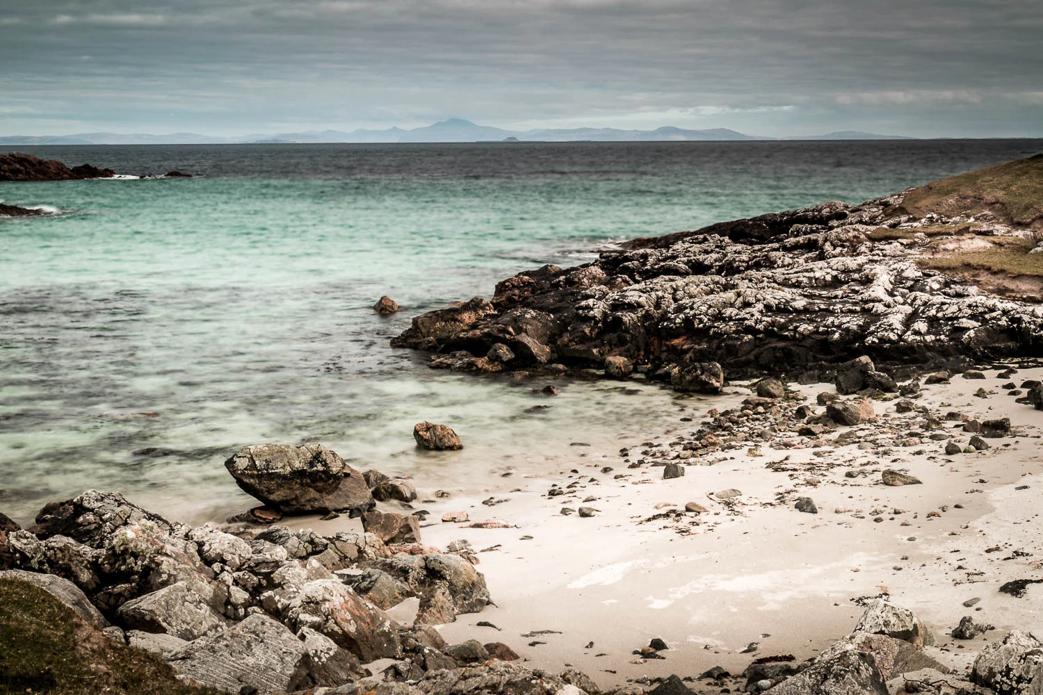 Eilean an Arbhair, Scarinish looking to Ben More on Mull.