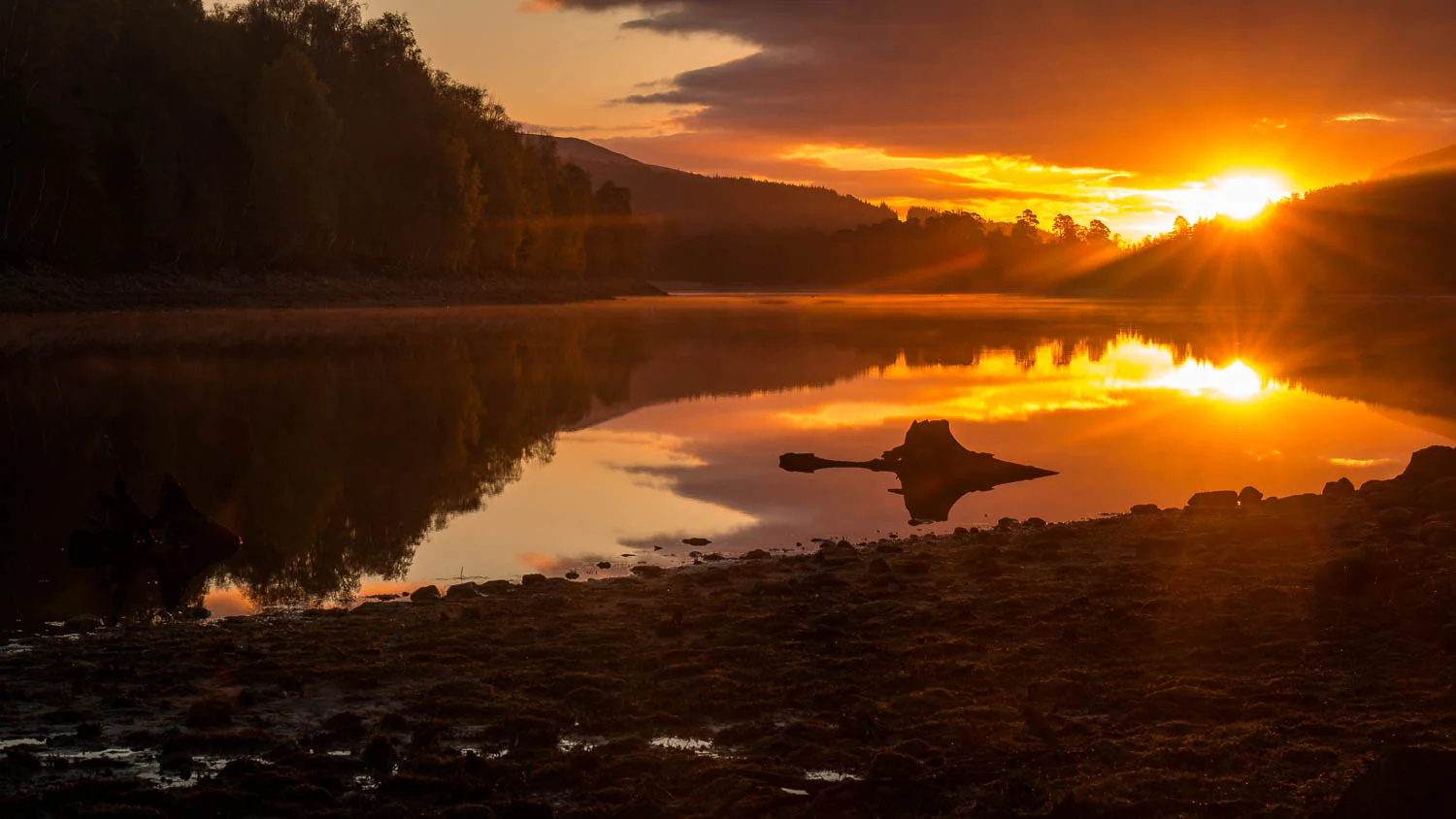 Loch Beinn A' Mheadhoin at sunrise.