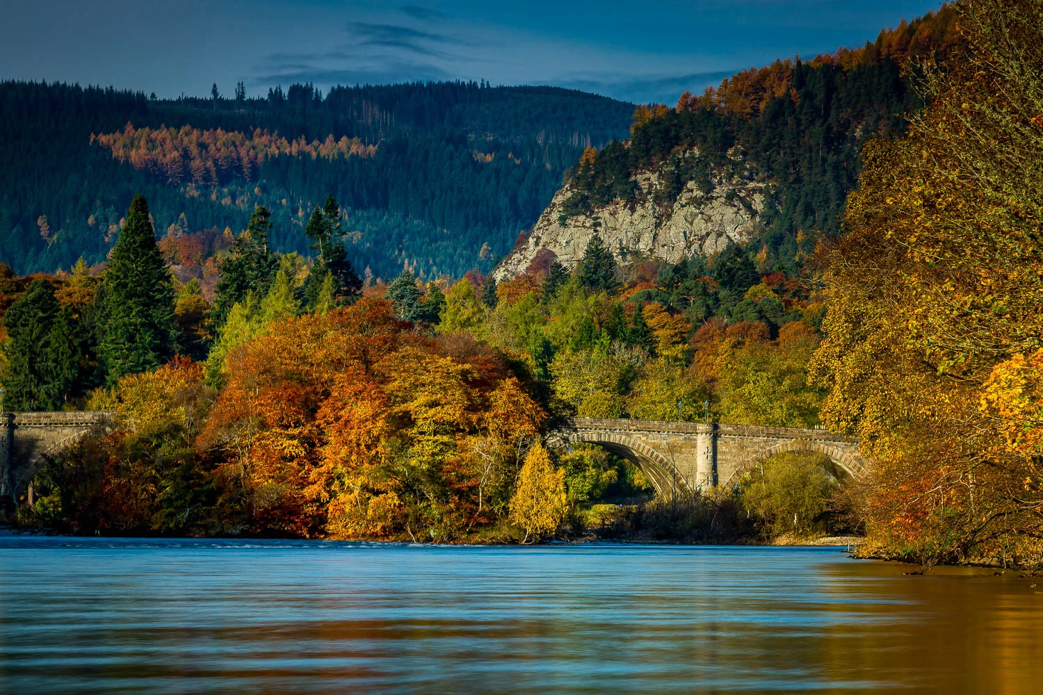Dunkeld Bridge under early morning sun.