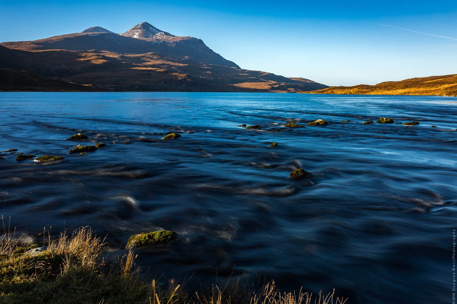 Fionn Loch and Cul Mhor in mid-morning light.