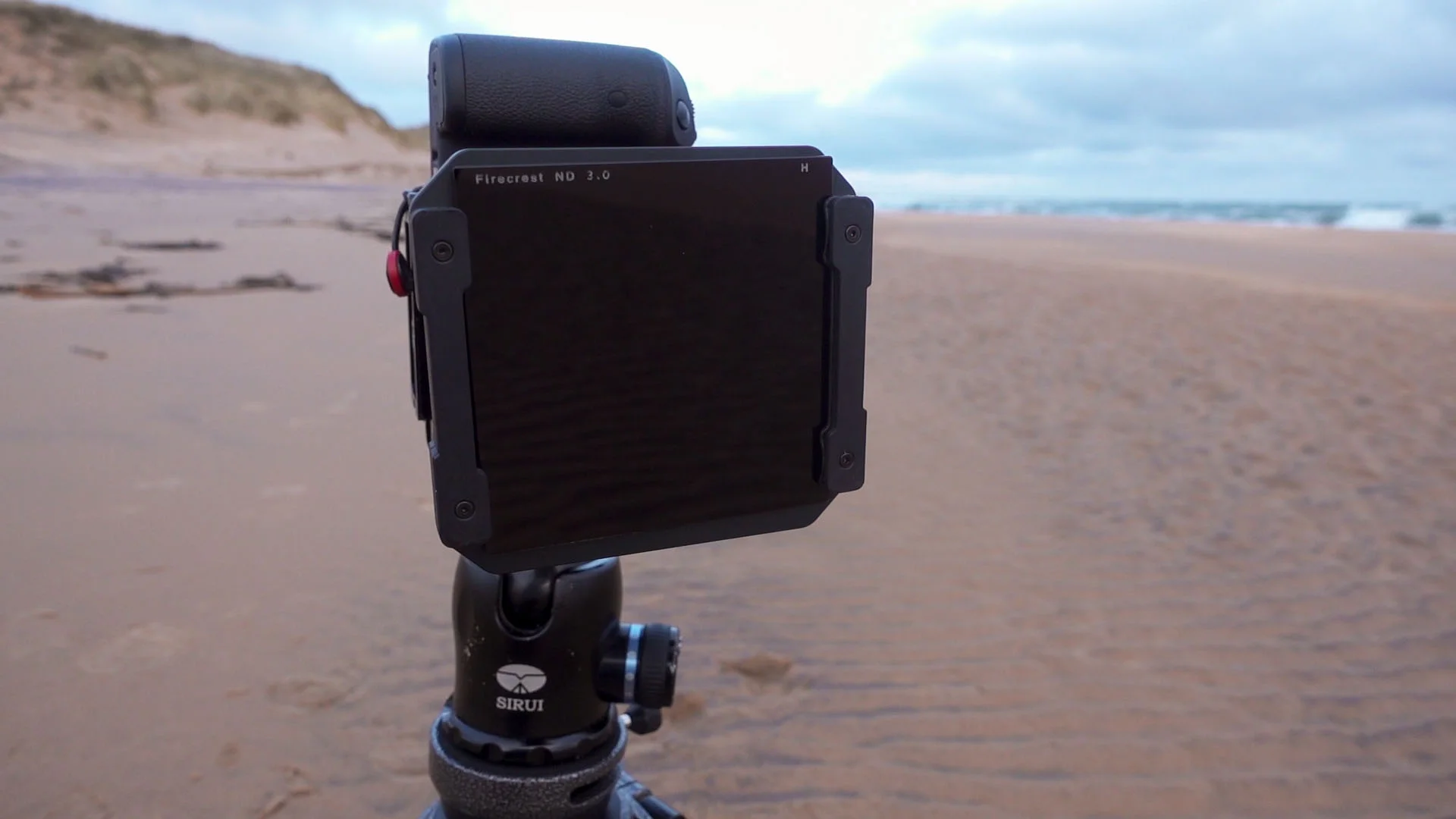 A 10 stop 'ND' filter attached to the front of the lens.