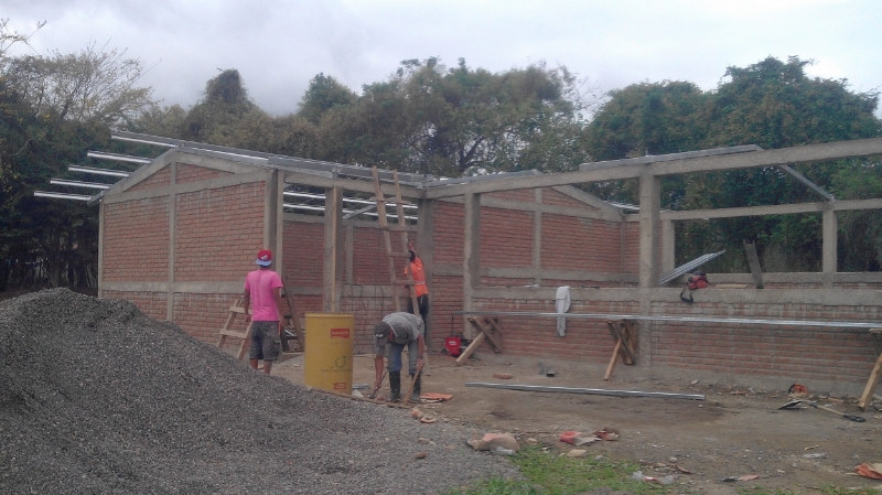 Installing the roof on the new classroom building