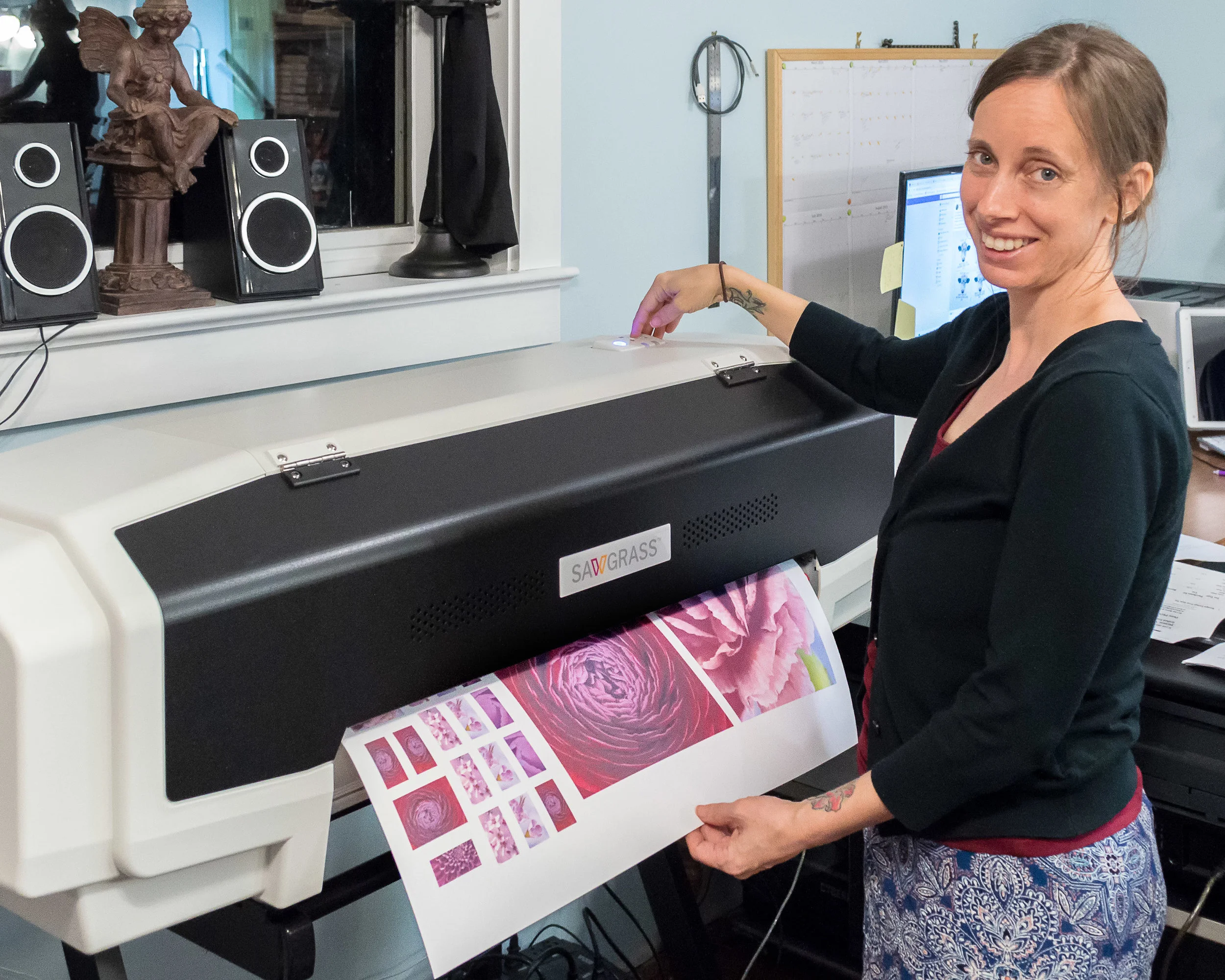 I print all of my work in house. The printer you see here prints using a special dye that I fuse directly into the surface of my pieces.