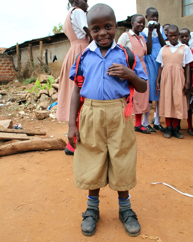 Brian in his new uniform on his first day at school. Will he ever grow into those shorts!