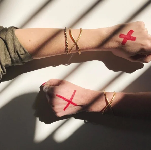 wearetribeofdreamers: "Shine a light on slavery today. These X bracelets help @enditmovement fight human trafficking all over the world." (Image courtesy of Tribe of Dreamers via Instagram)
