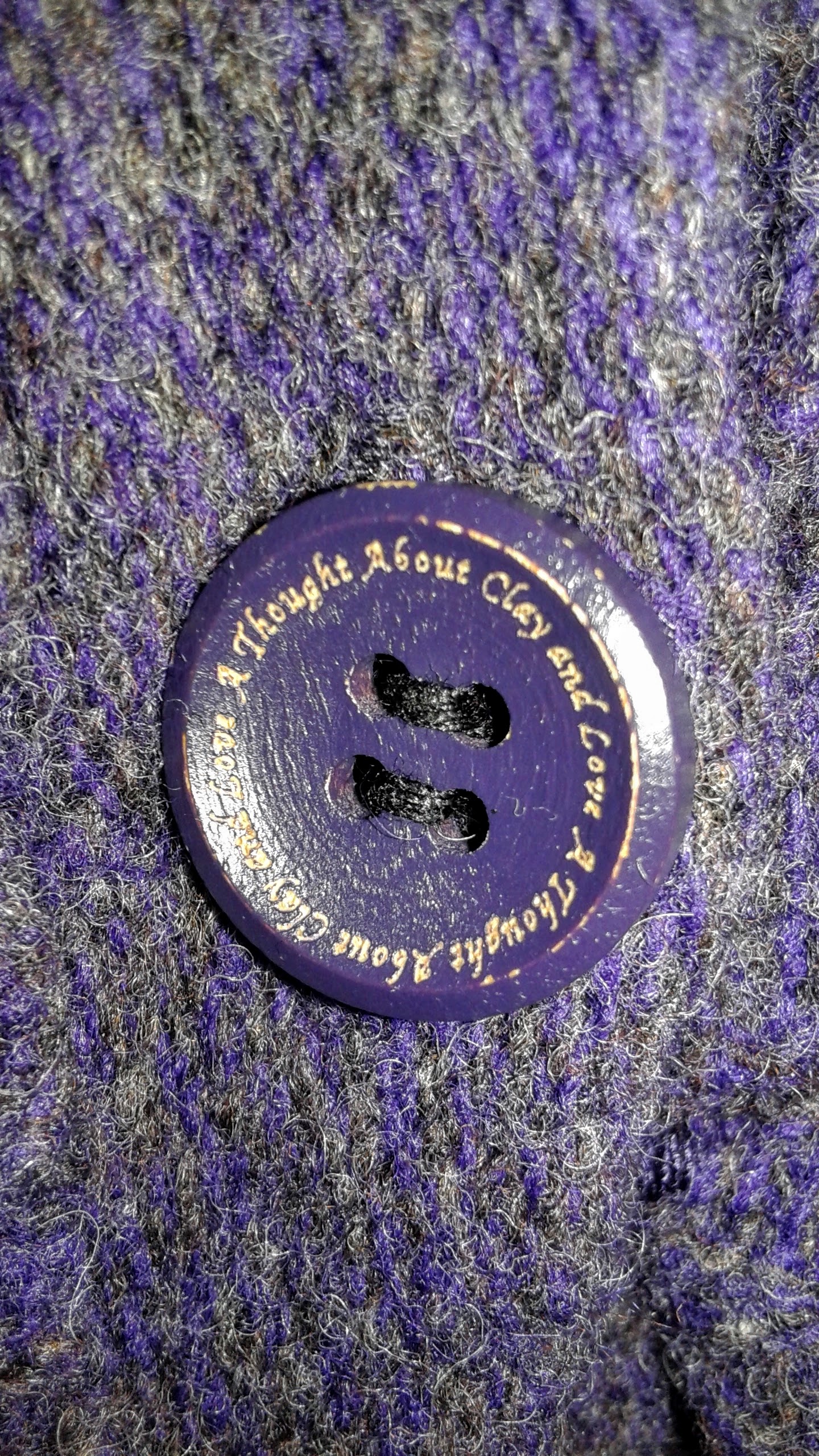 Moth button, "A thought about clay and love"...oooooookaaaay