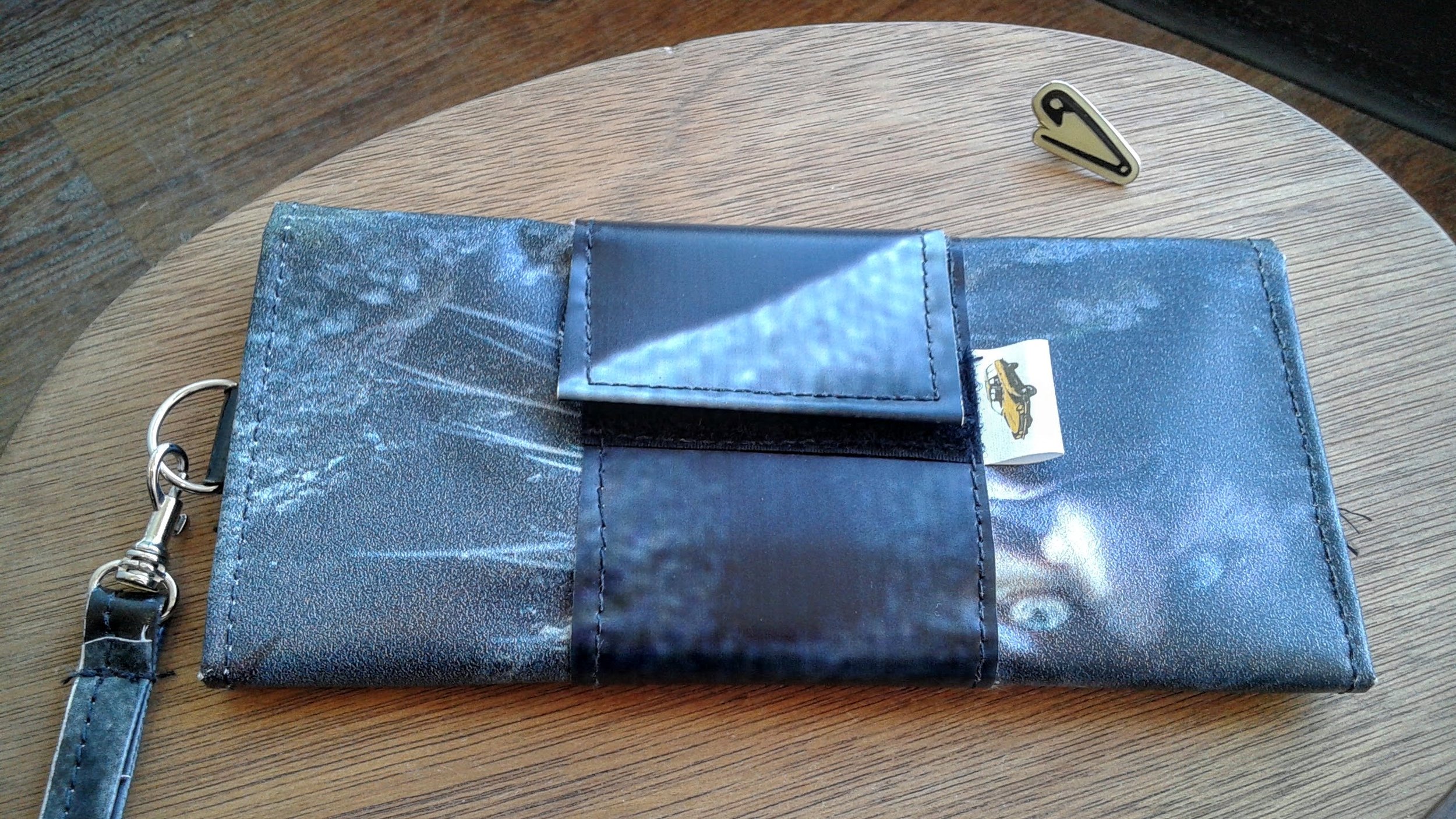 Pinto Bags wallet, $16; Saftey pin pin, $7