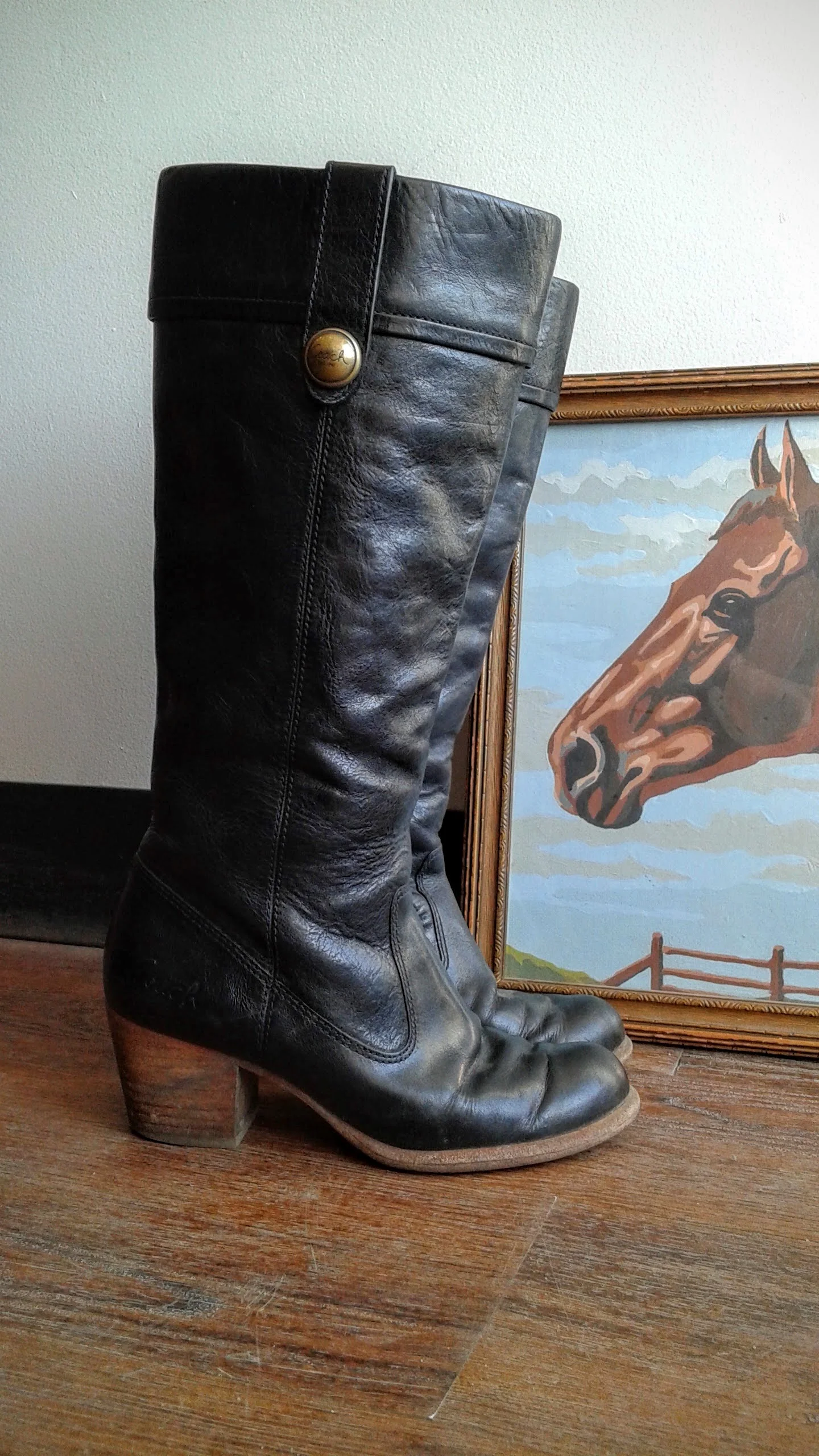 Coach boots; S5.5, $40