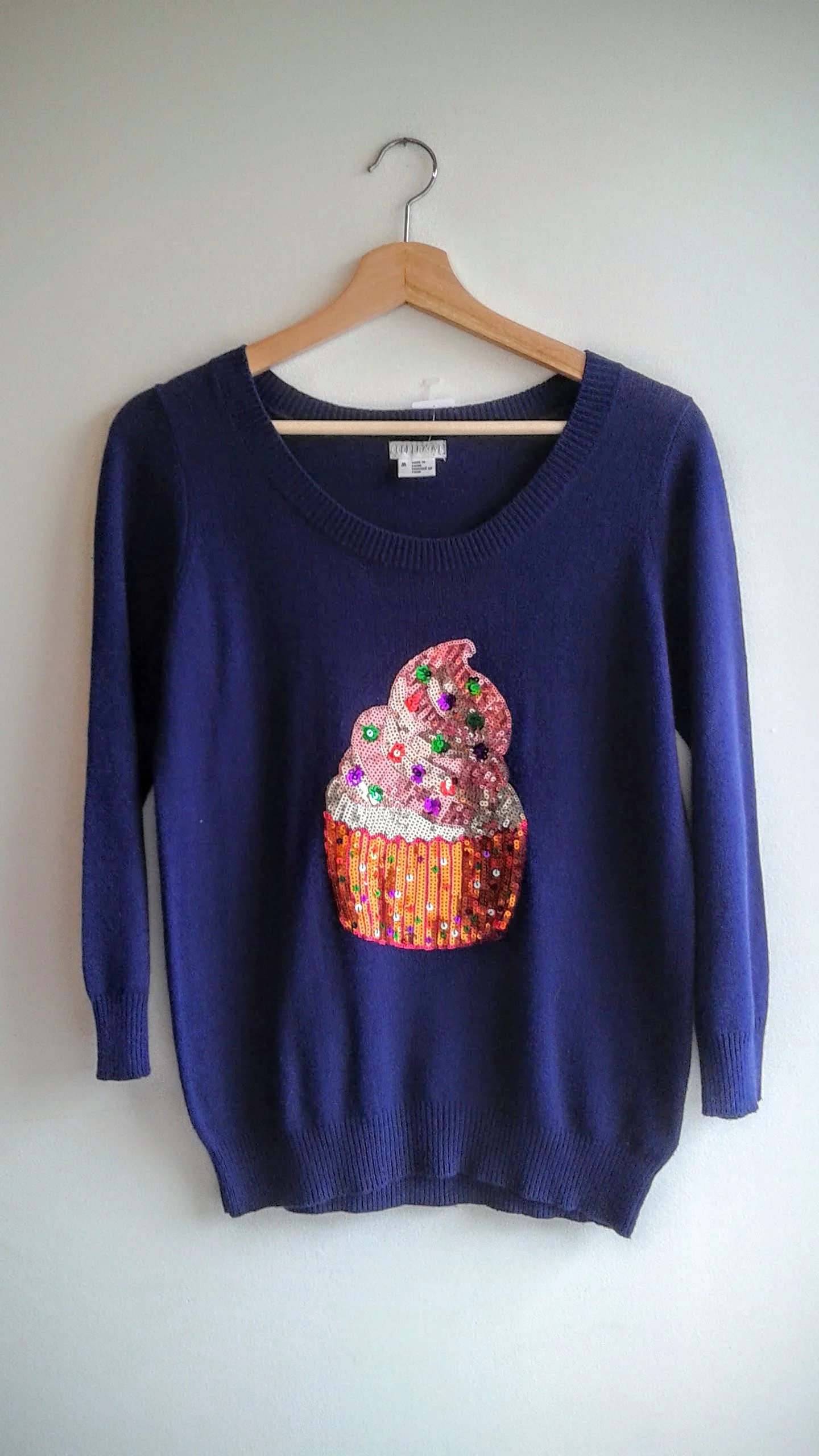 Cooperative sweater; Size M, $28