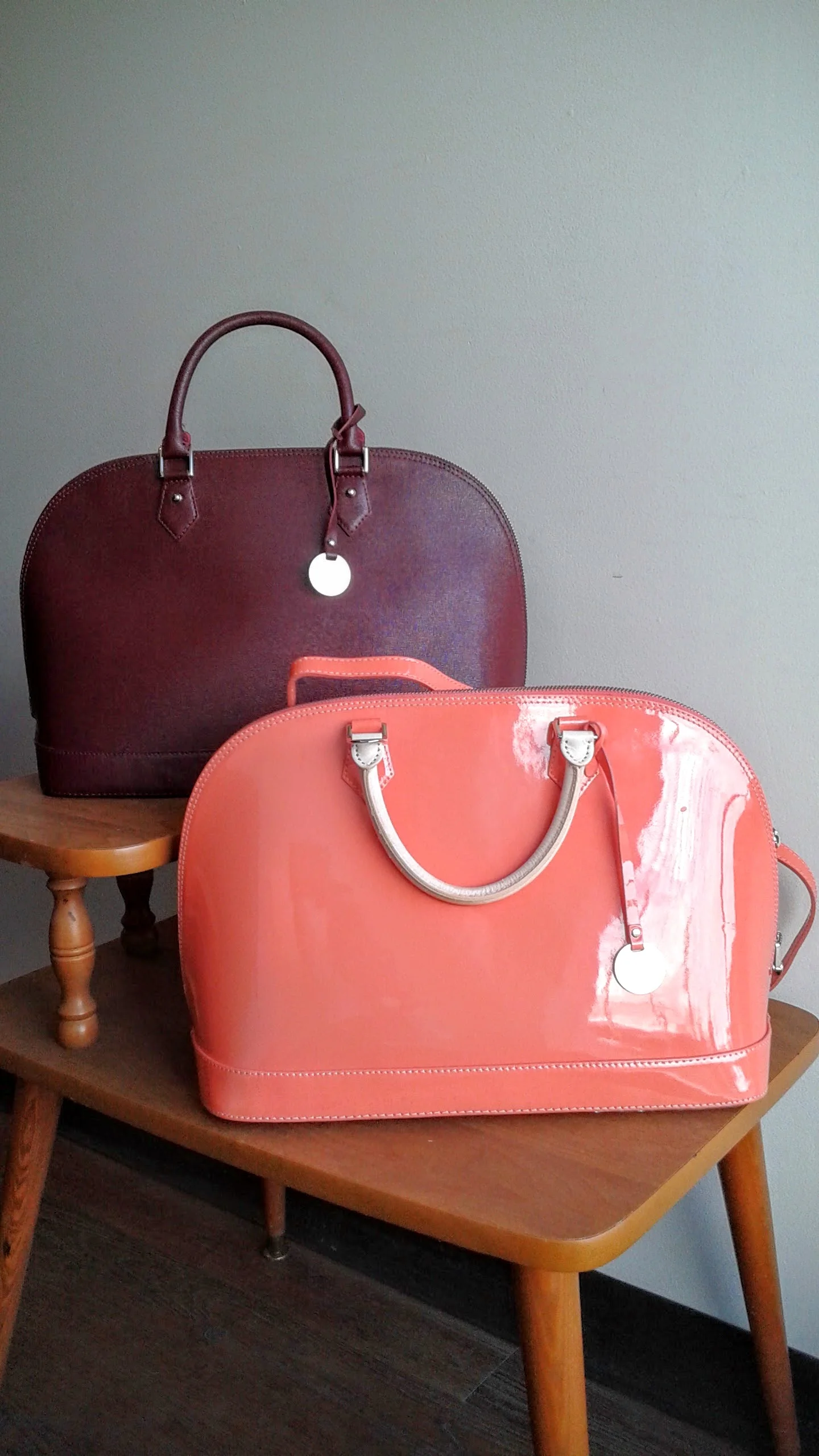 Pulicati bag; Maroon, $175; Coral, $125