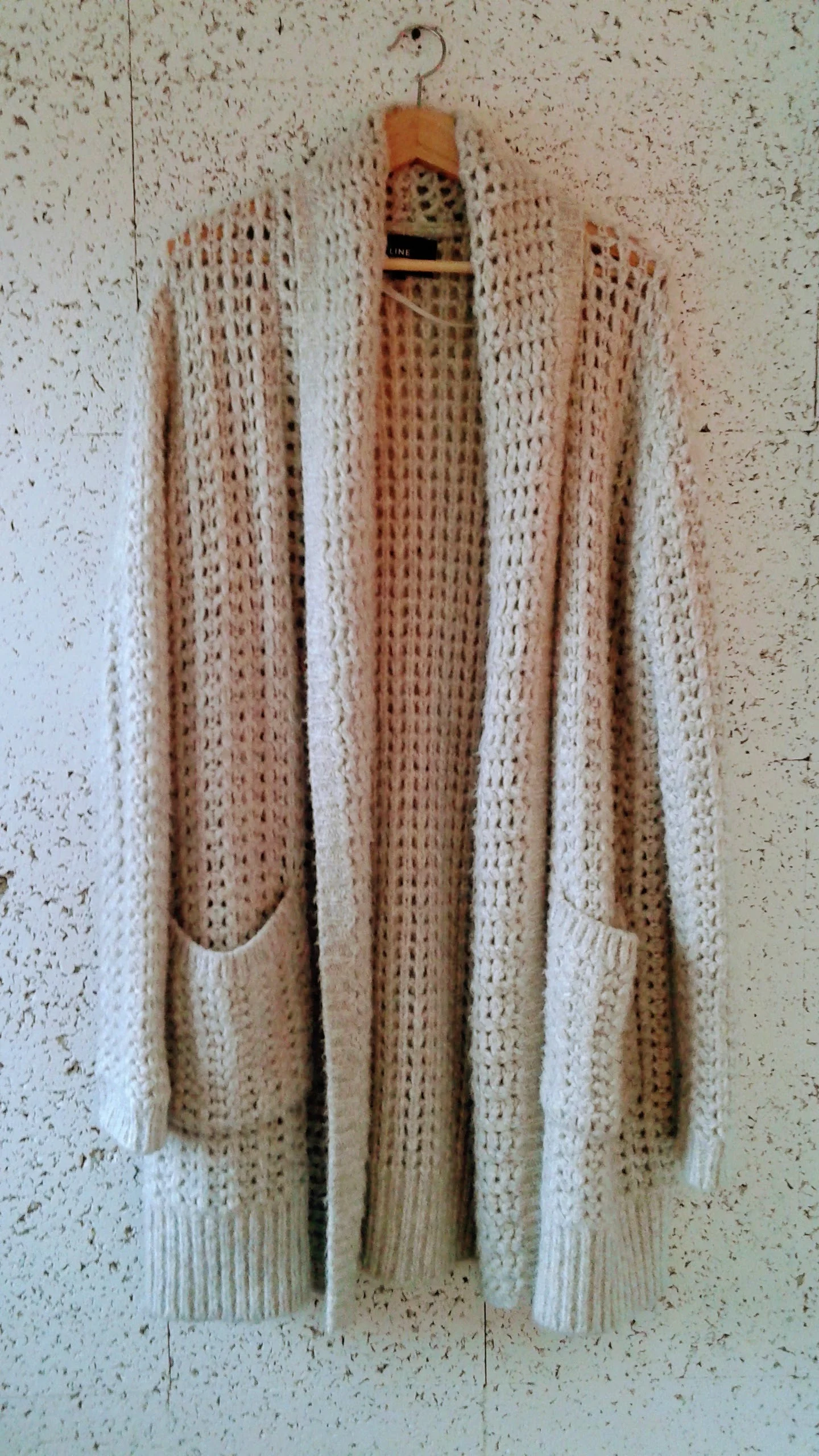 Line cardigan; Size L, $58