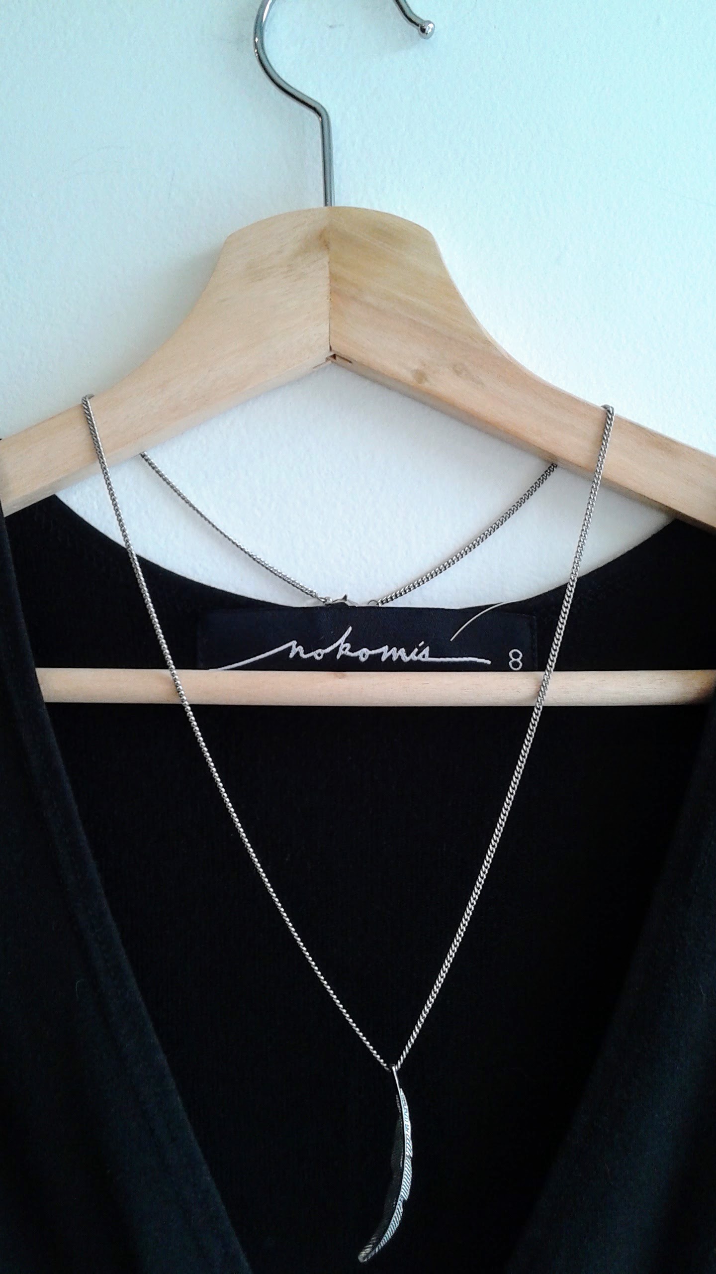 Feather necklace, $14
