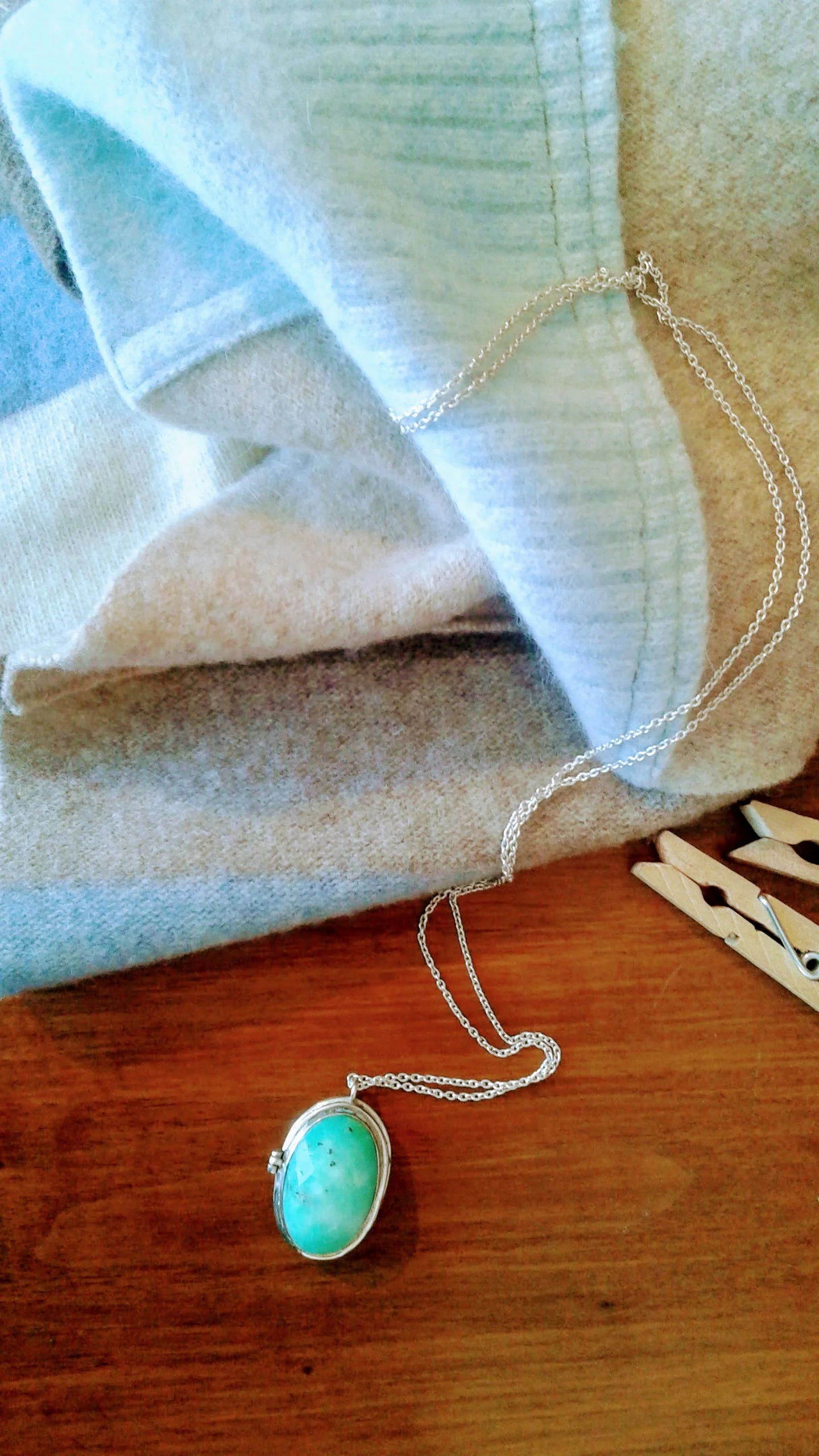 Jade locket, $30. Preloved scarf, $14