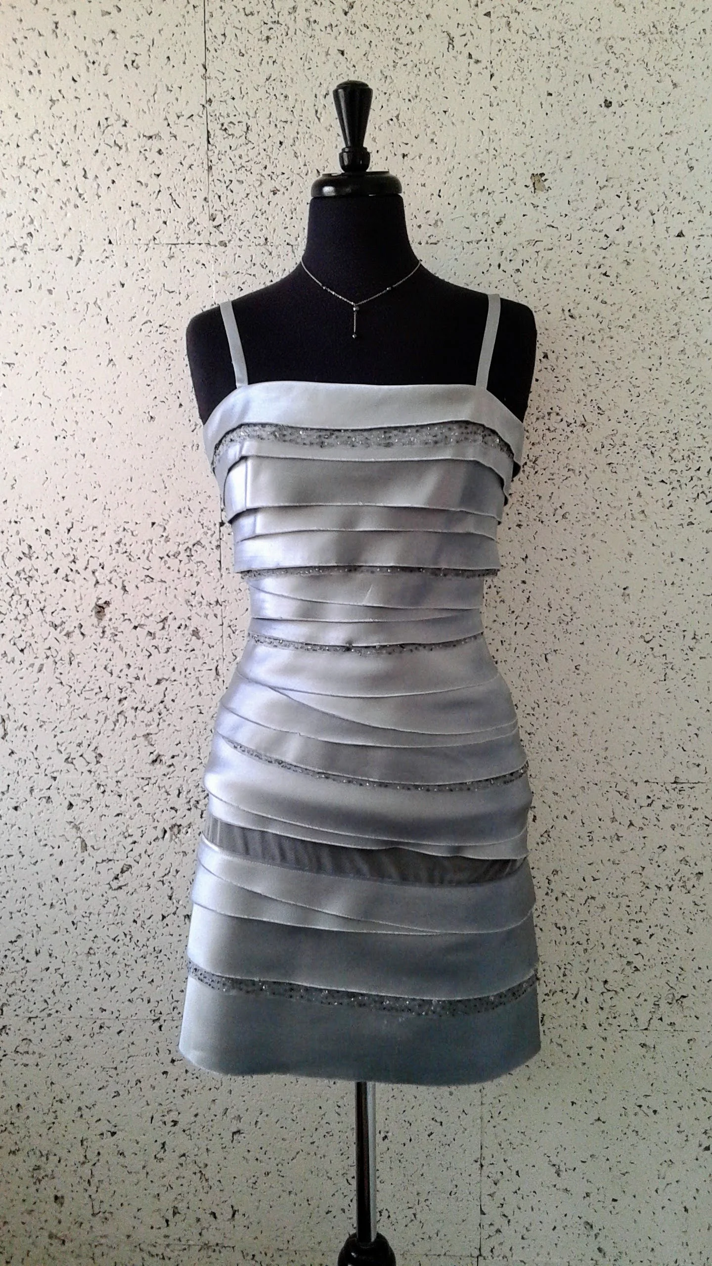 BCBG Max Azria dress; Size 4, $54. Necklace, $12