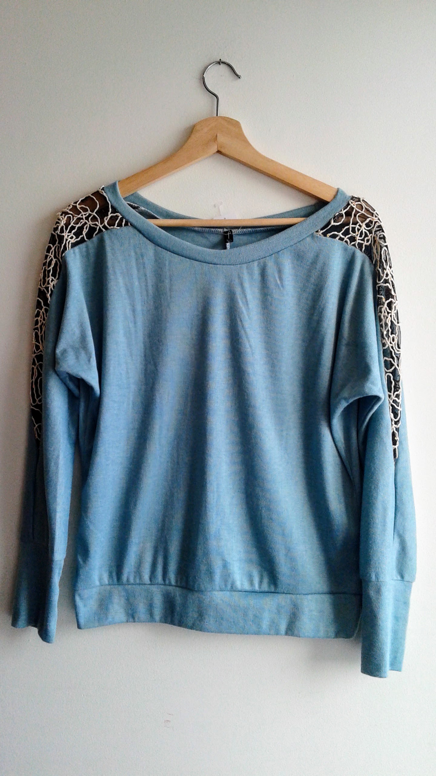 Blue top; Size M, $18