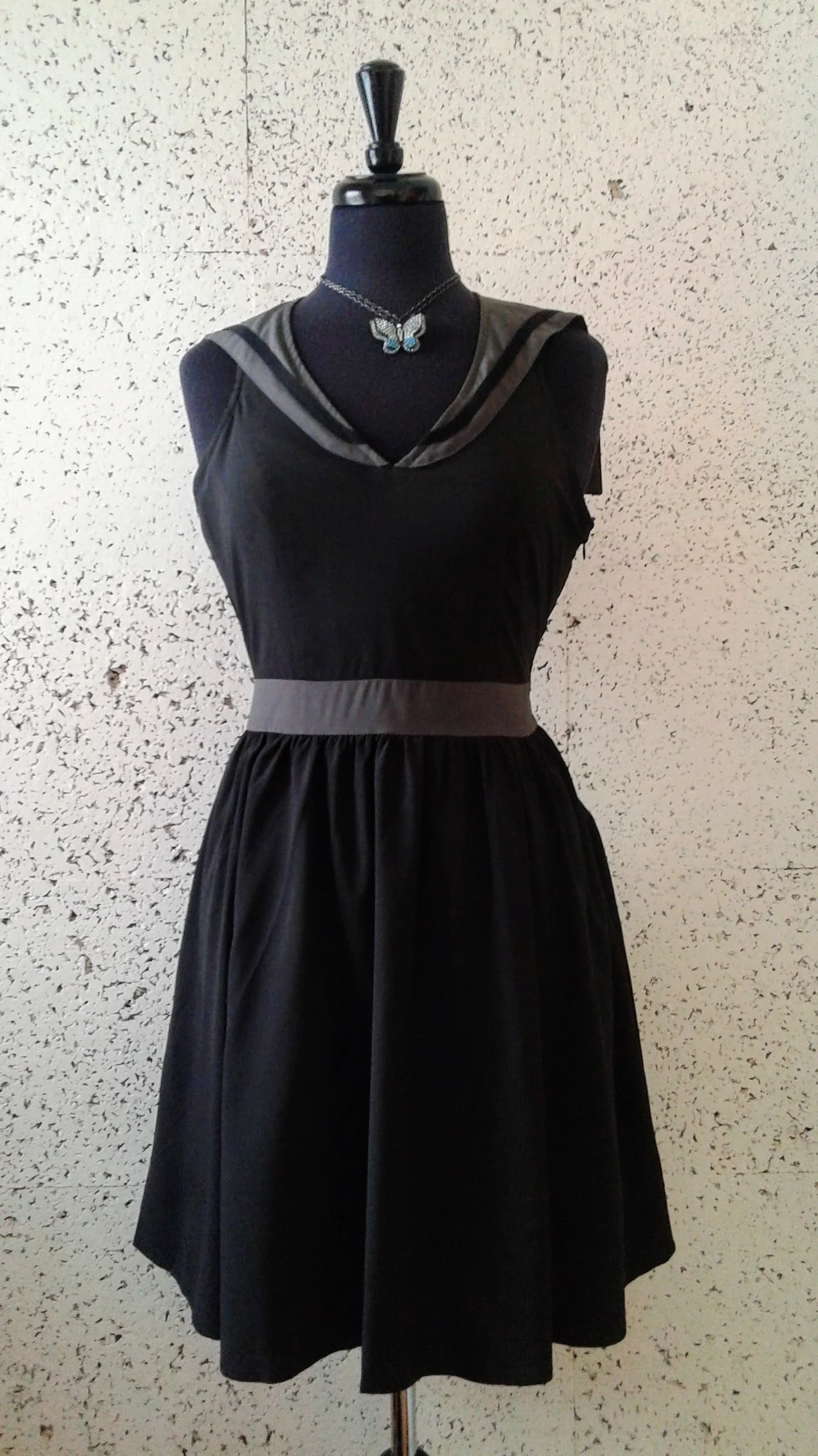 Sourpuss dress (NWT); Size S, $38. Necklace, $30