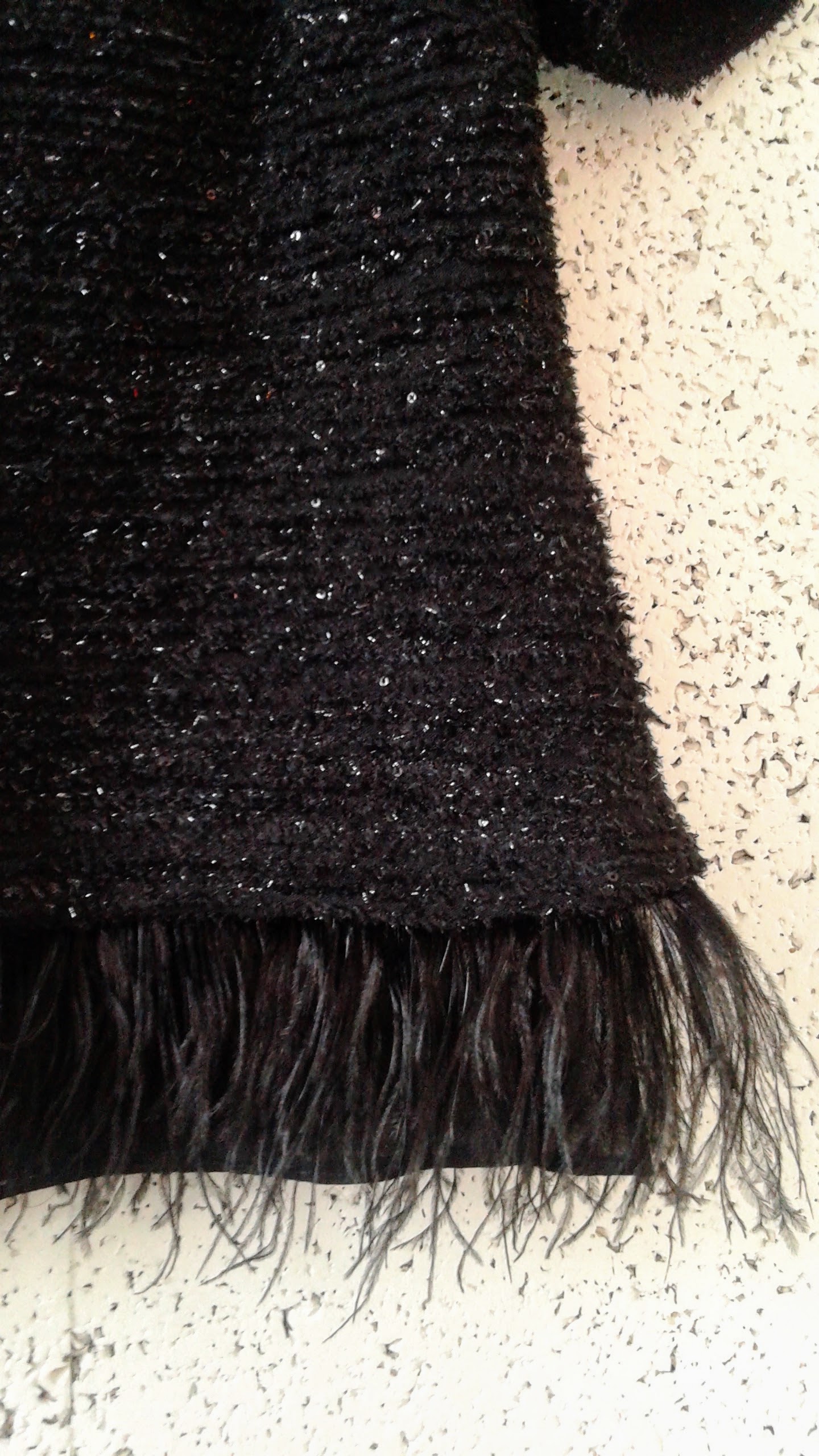 Feathers! (Not actually real feathers, though, so go ahead and wash it!)