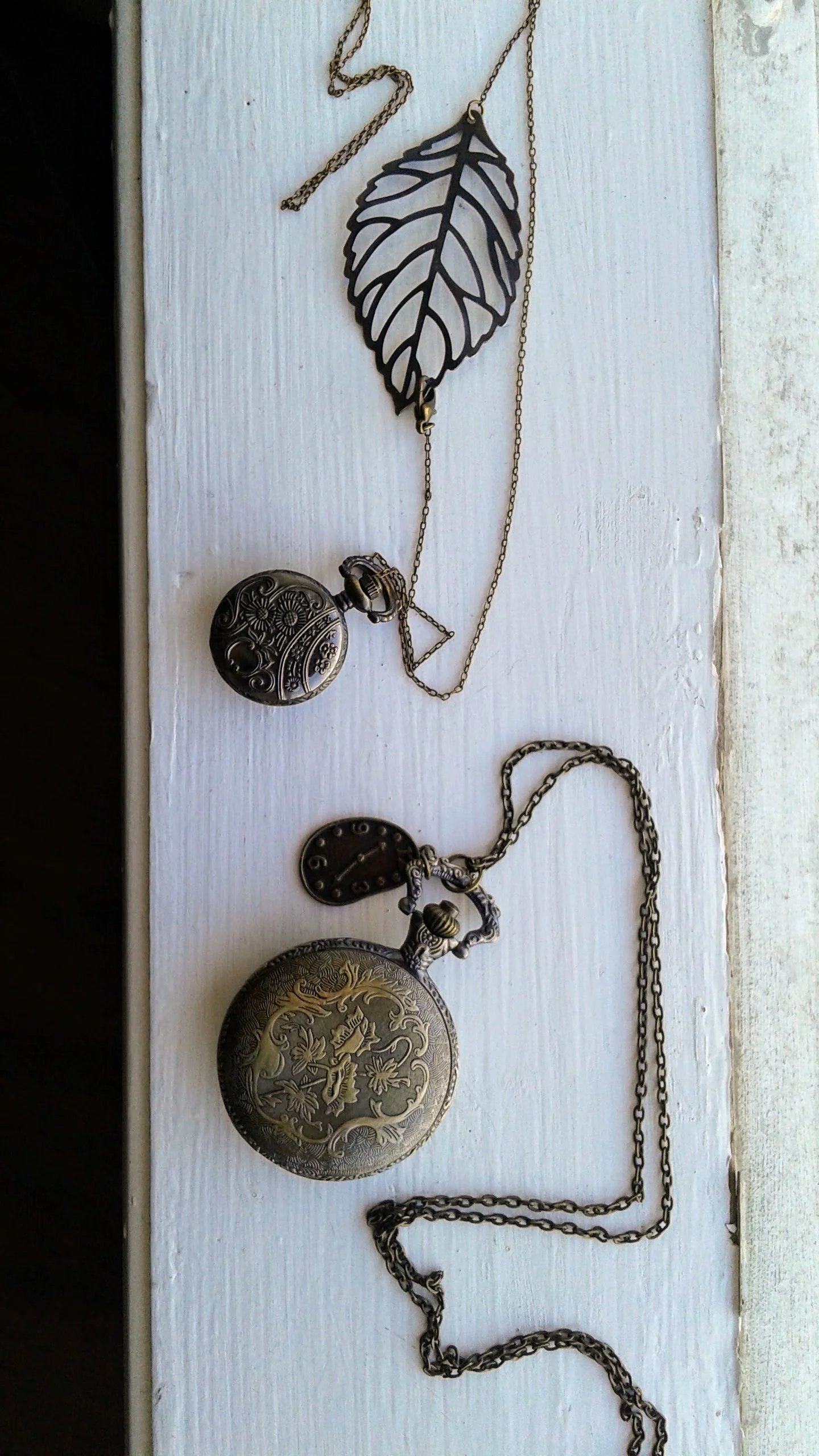 Small pendant, $18; Large pendant, $20