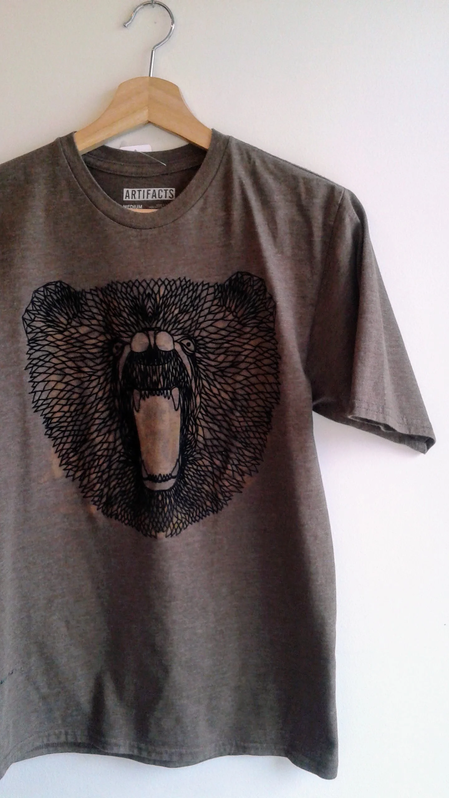 Artifacts shirt; Size M, $24