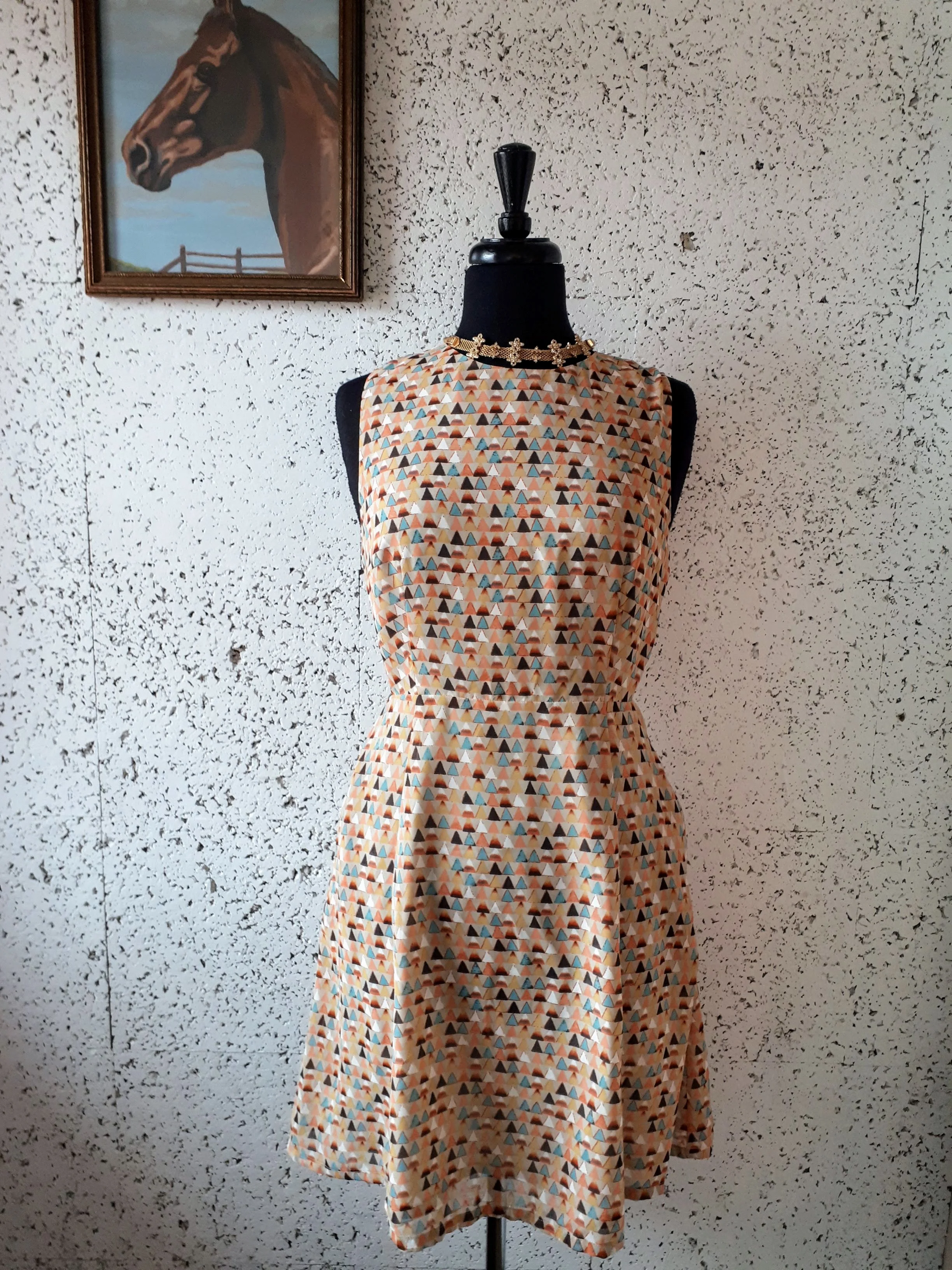 Loft 82 dress; Size S, $38. Necklace, $22.