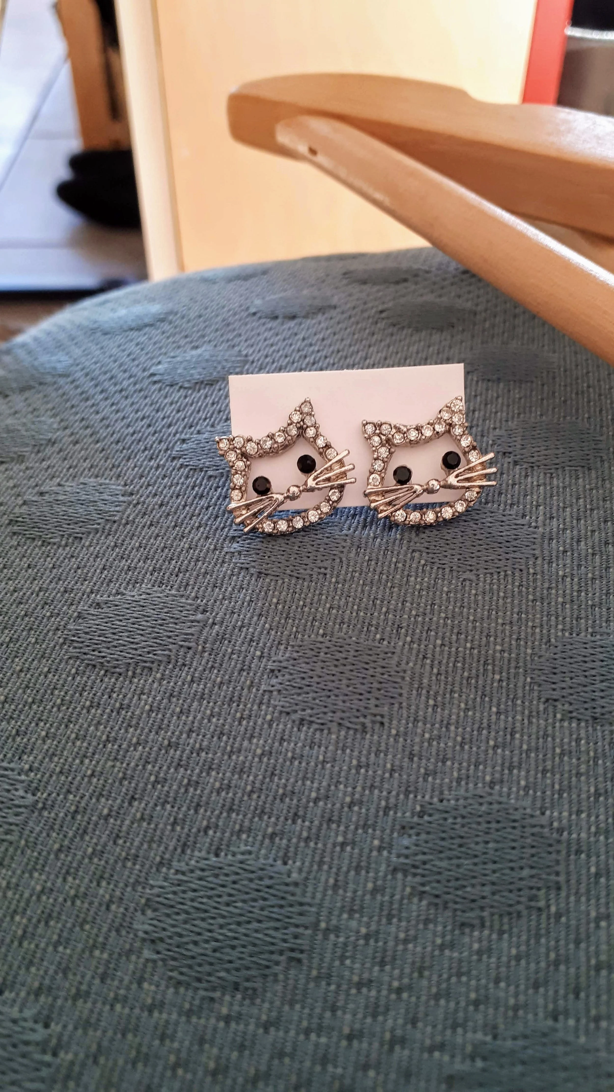 Earrings, $12
