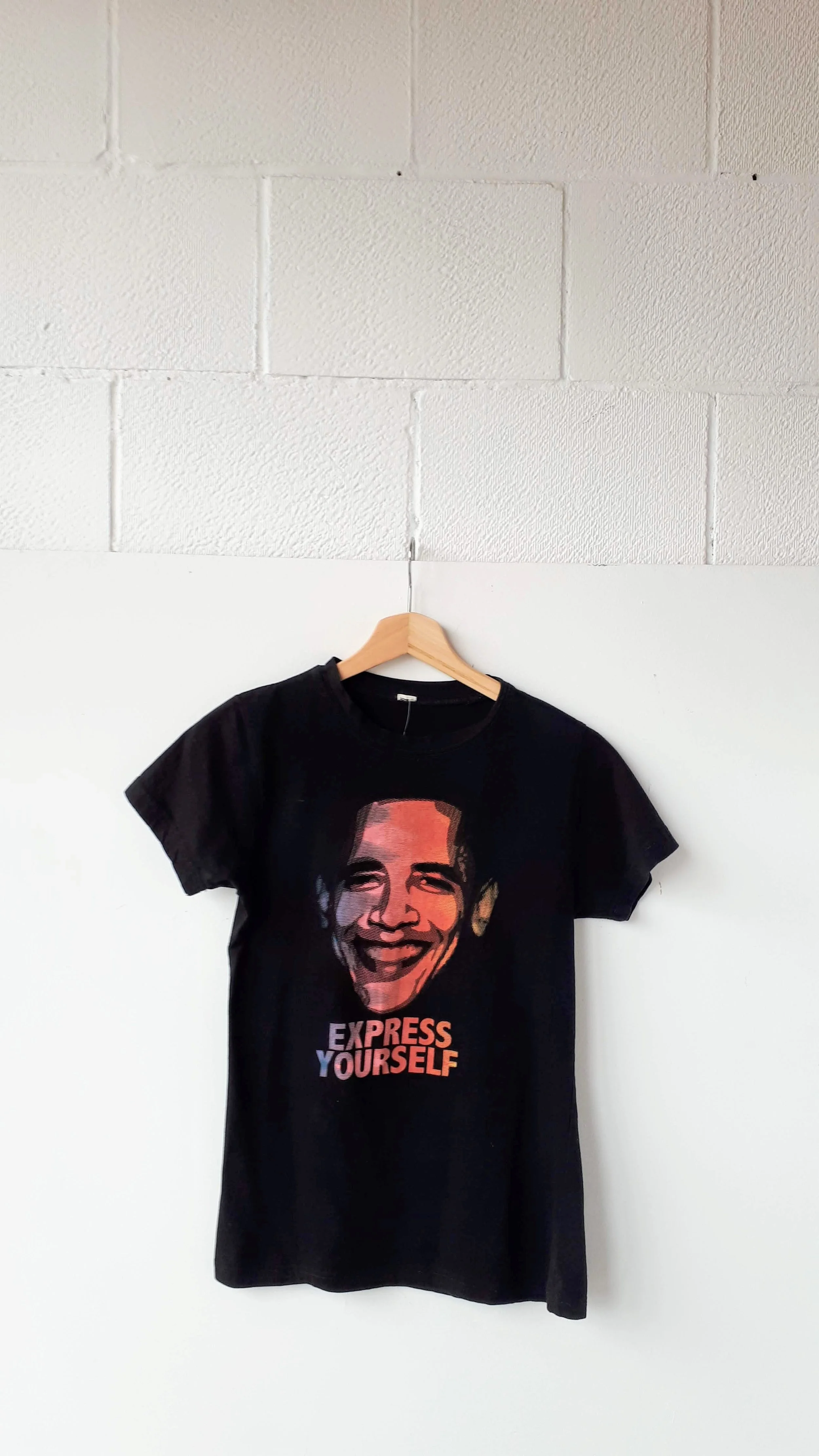 T-shirt; Size S, $28