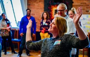 Coach Kate gets excited during group coaching