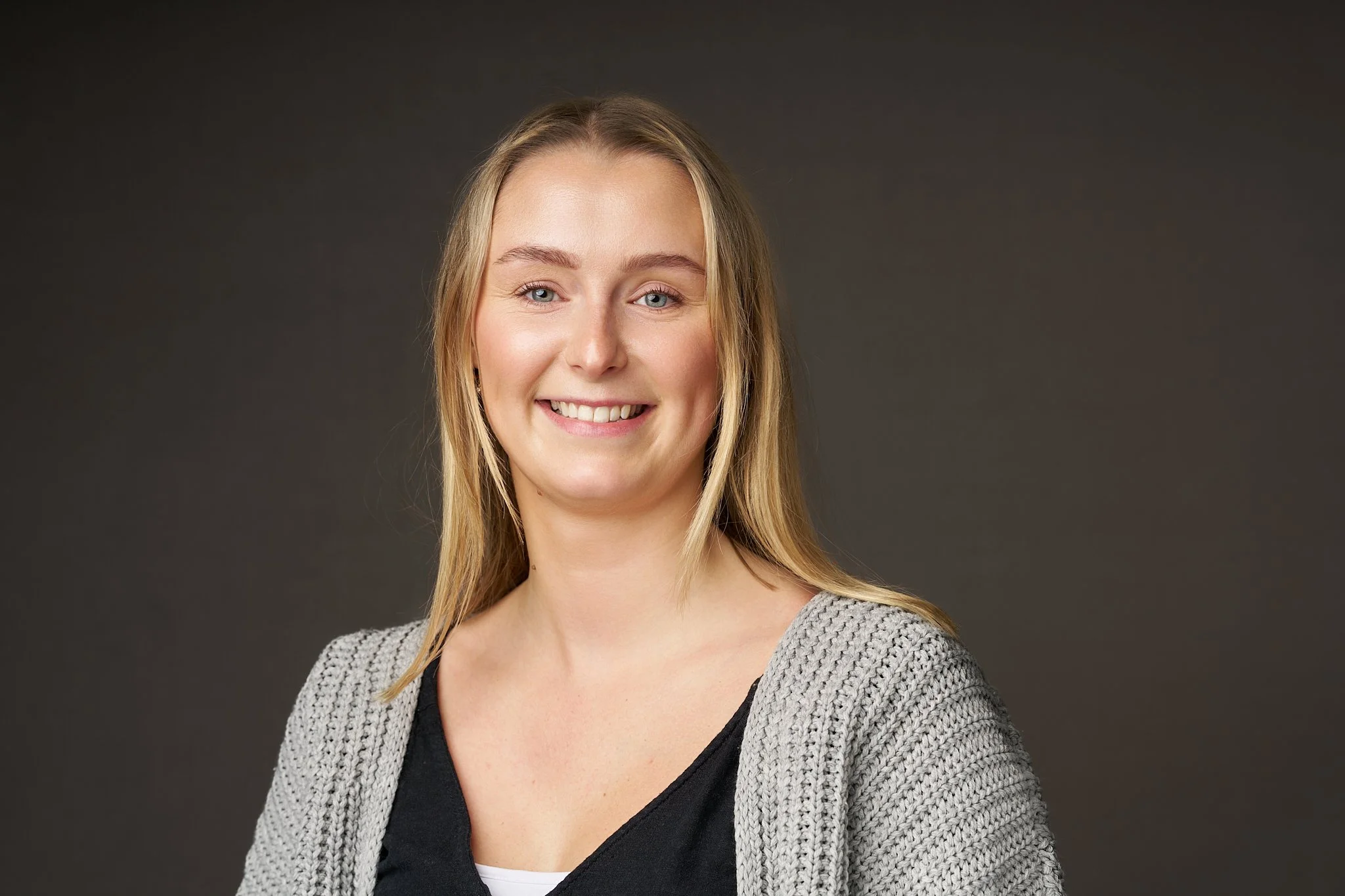 Professional LinkedIn headshot of a business professional with a clean neutral background in Leicester and Northampton