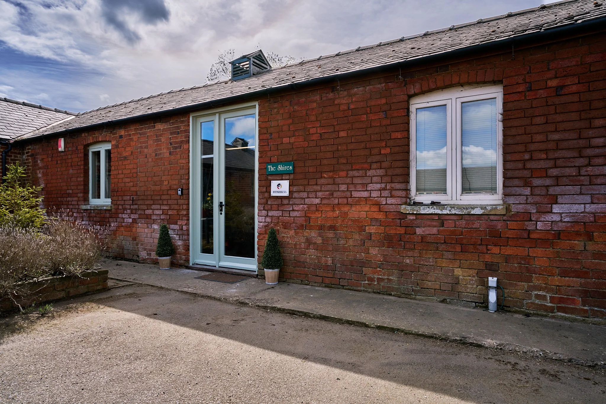 Exterior of over 50s gym in Market Harborough located in a converted farm building
