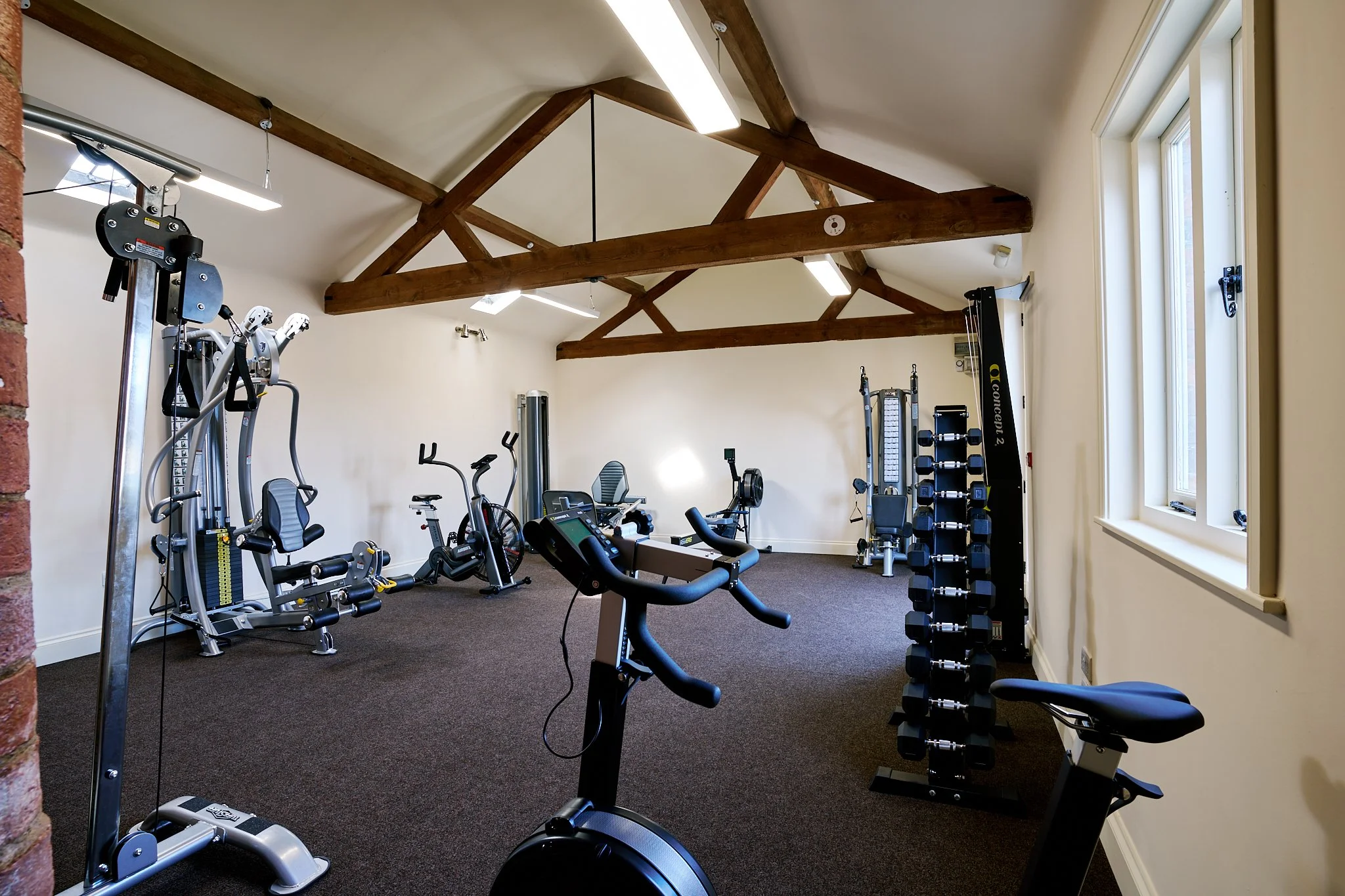 Bright interior of over 50s gym in Market Harborough showing modern fitness equipment and layout