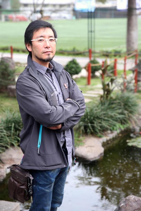 Peruvian scientist Marino Morikawa poses at the Japanese Garden - EFE/Ernesto Arias