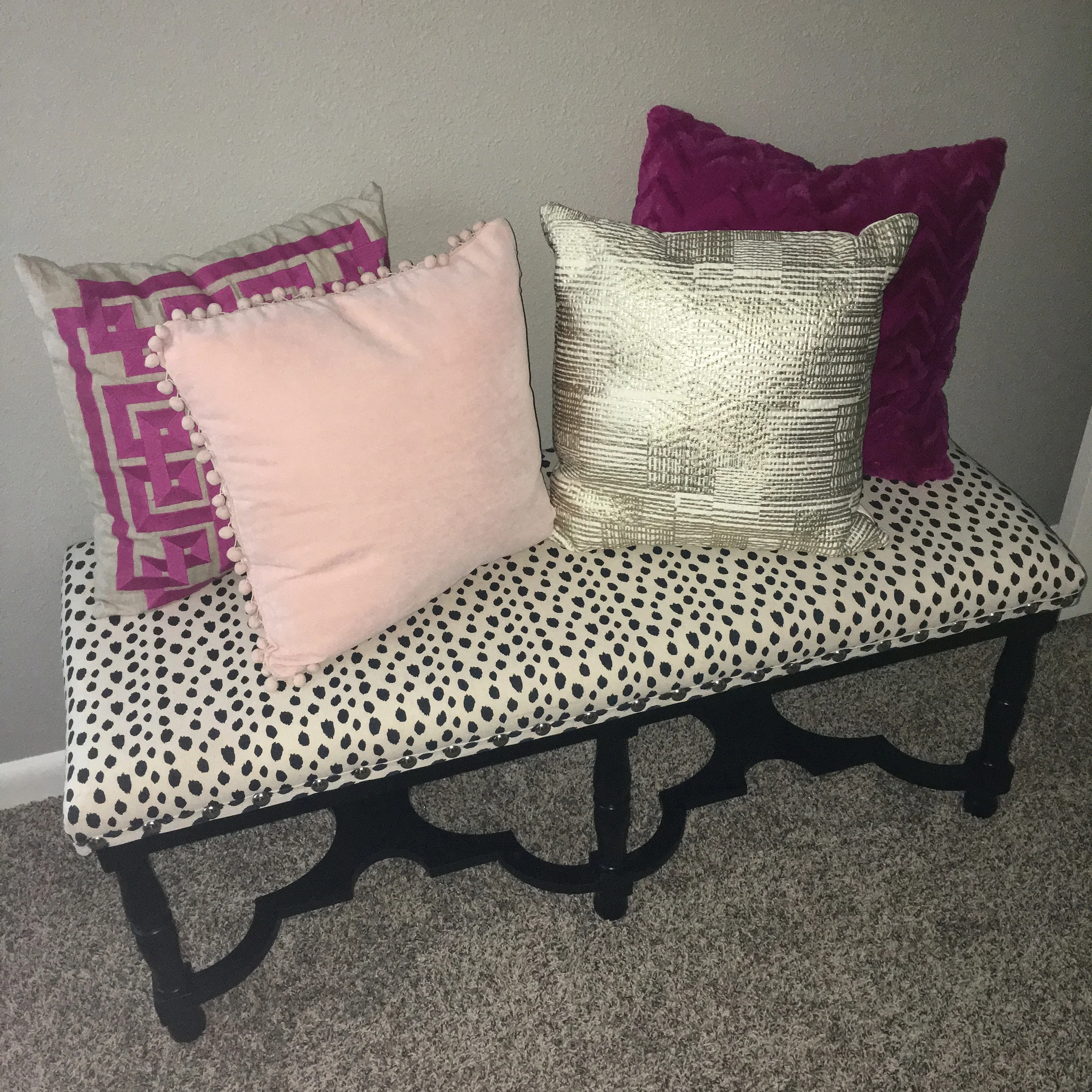 Only $129 from HomeGoods! Such a steal! And the pillows add a nice touch. 