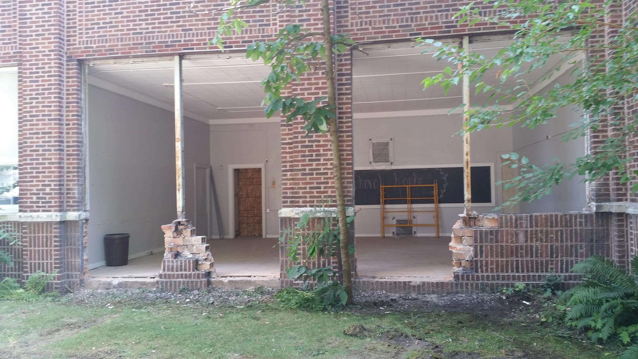 Demo crew has opened up the north side of the building where our new stair tower will go. That's the old 600-second party room!