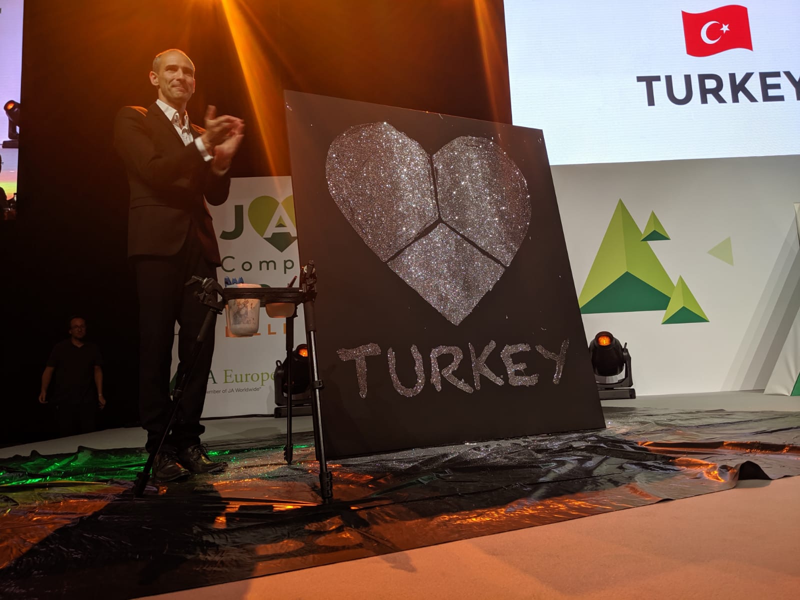 Artist’s design to reveal the 2019 Company of the Year winner—Turkey.